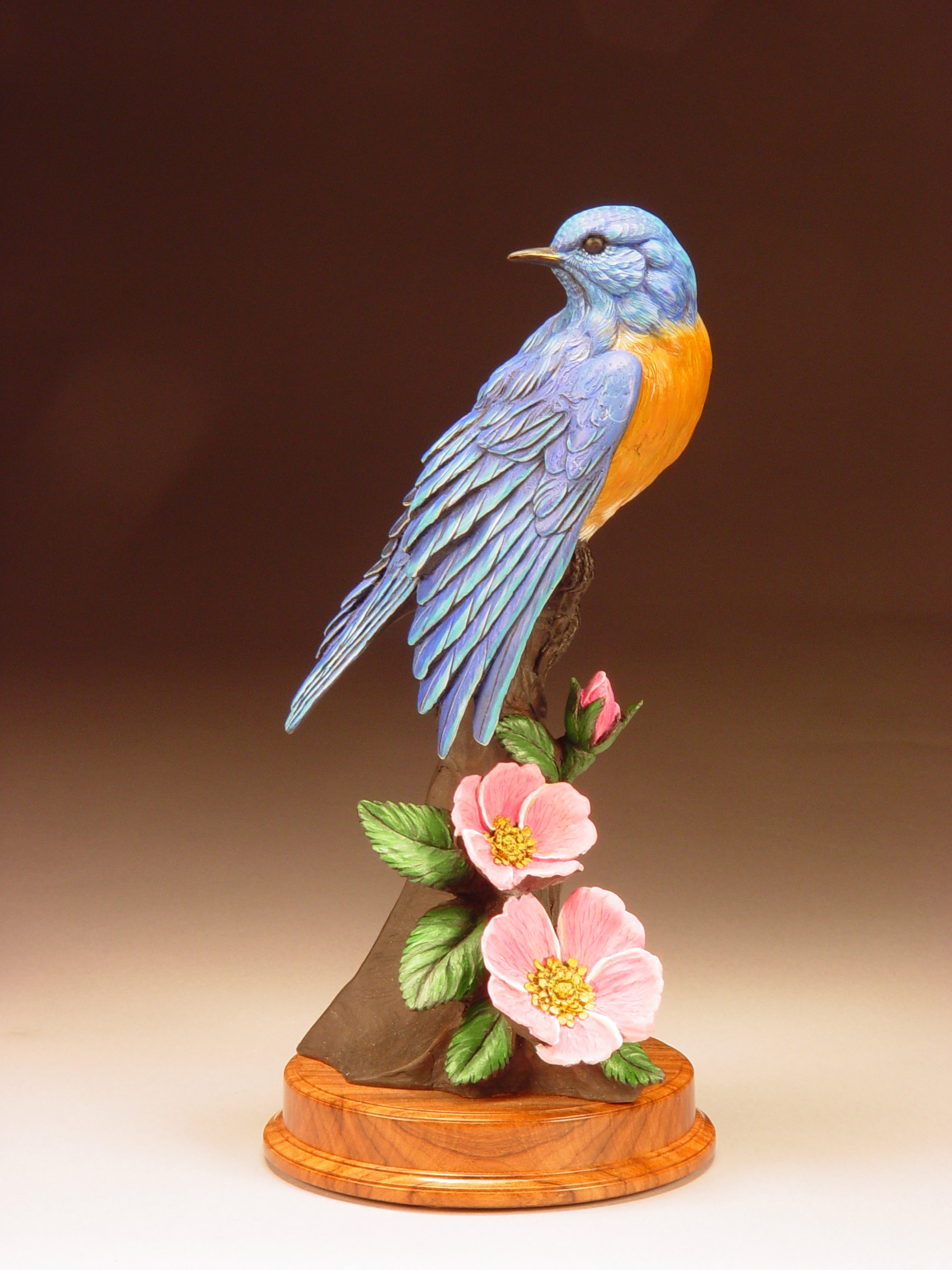 Western Bluebird and Wild Rose by Joan Zygmunt