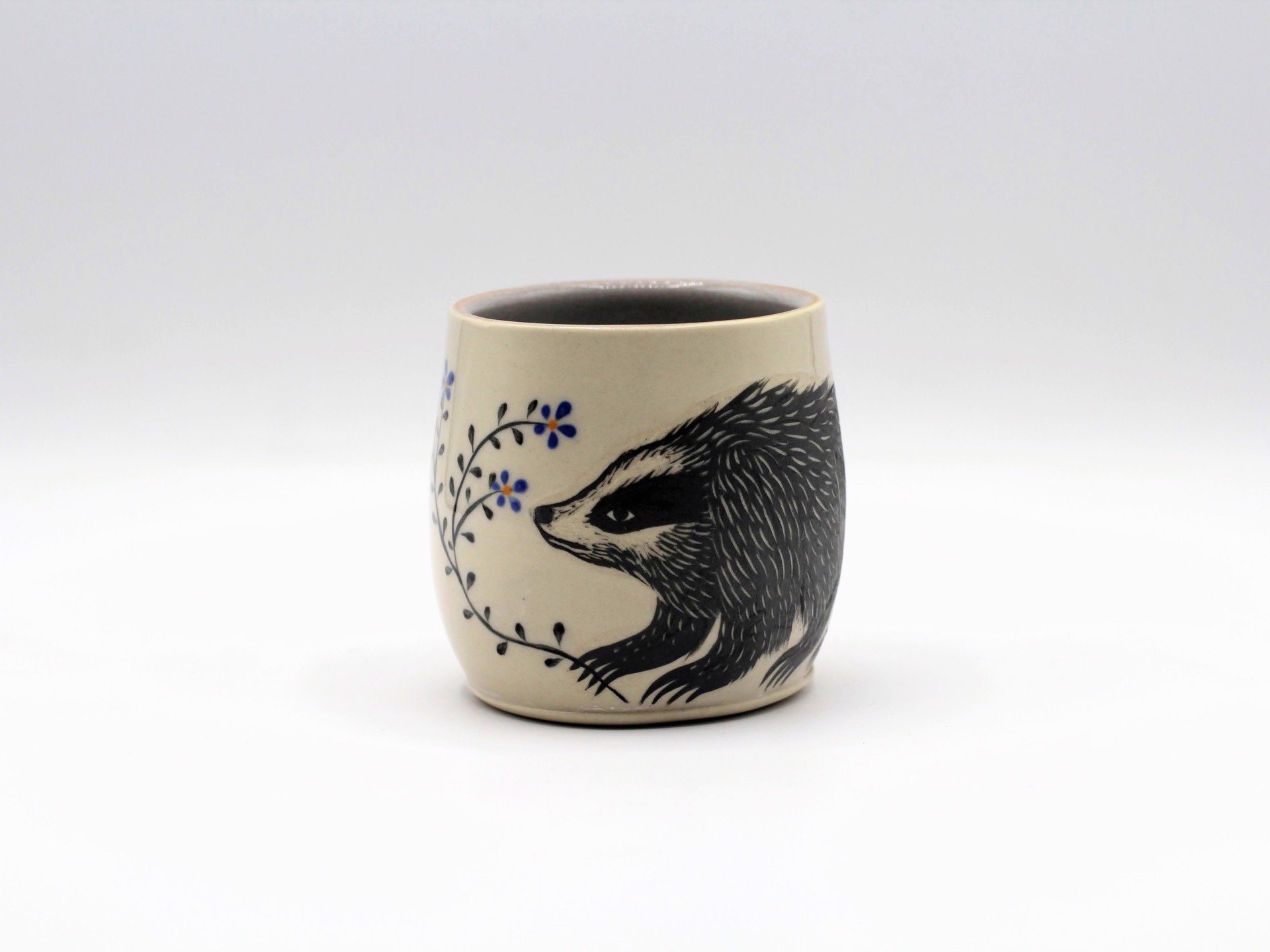 Badger and Flower Mug by Christine Sutton