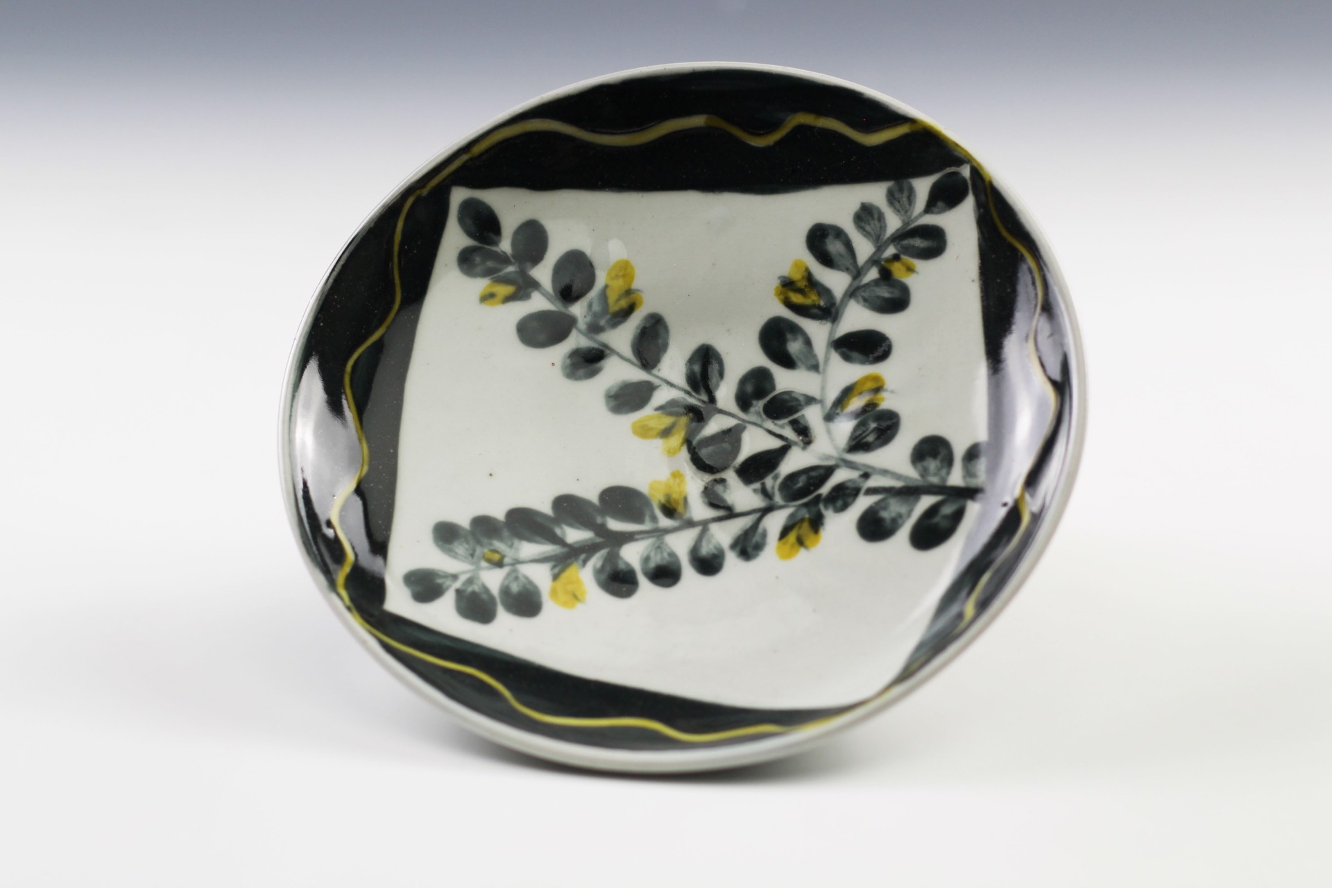 Black and Yellow Saucer by Glynnis Lessing