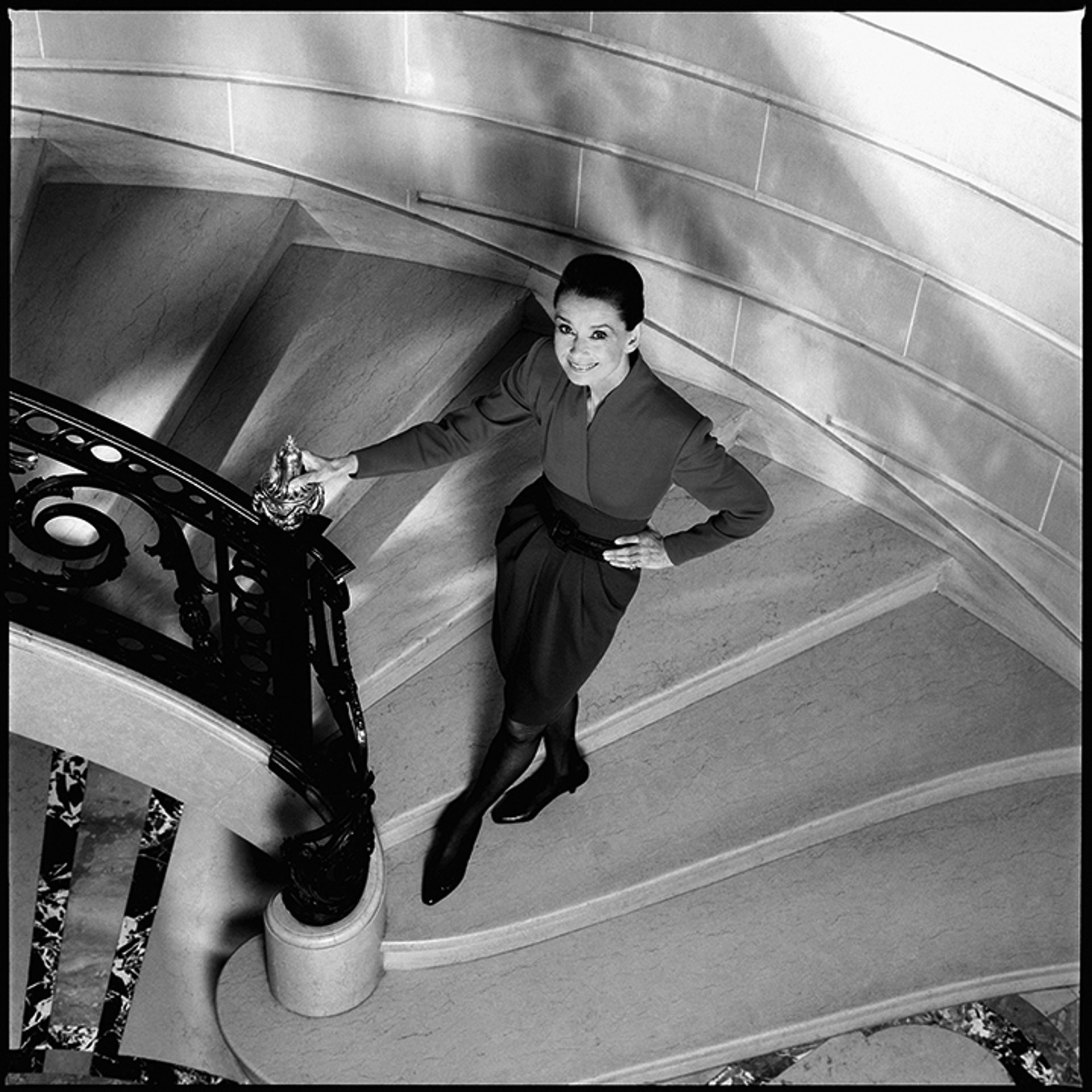 89003 Audrey Hepburn Smiling in Stairway BW by Timothy White