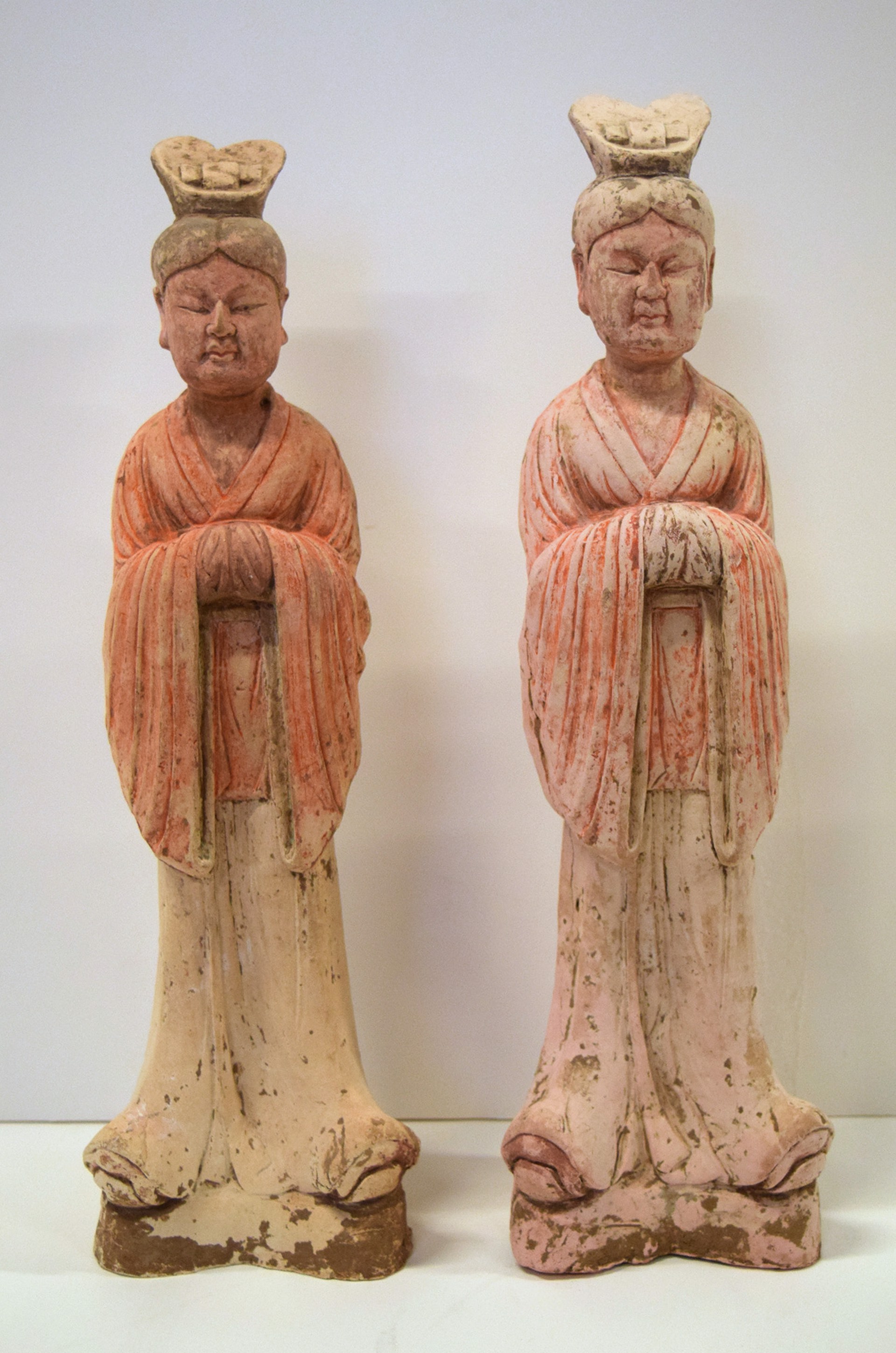 PAIR OF PAINTED POTTERY FIGURES OF COURT OFFICIALS