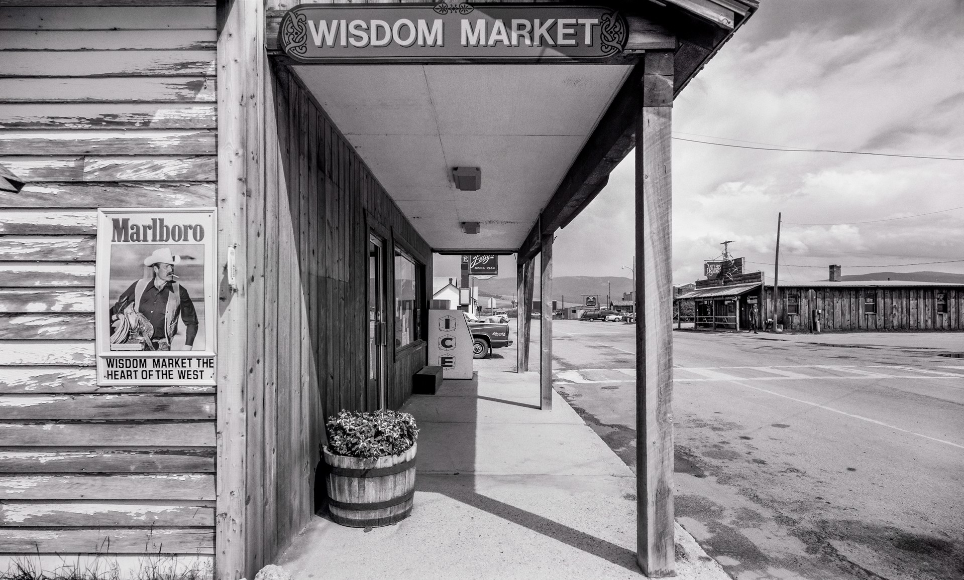The Real Marlboro Man & His Dog, Wisdom Market, Montana by Lawrence McFarland