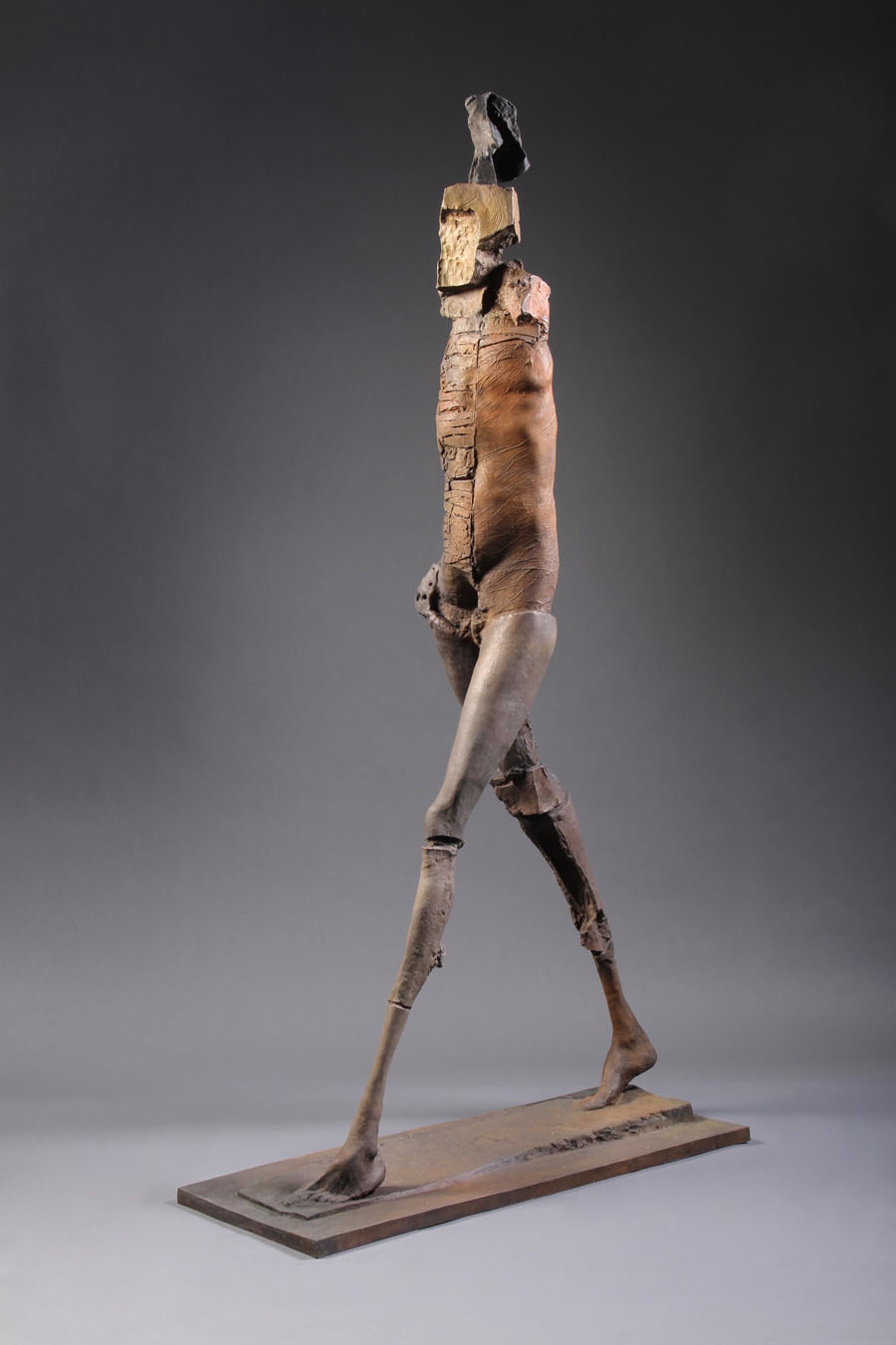 Deep Striding Woman (edition of 4) by Stephen De Staebler