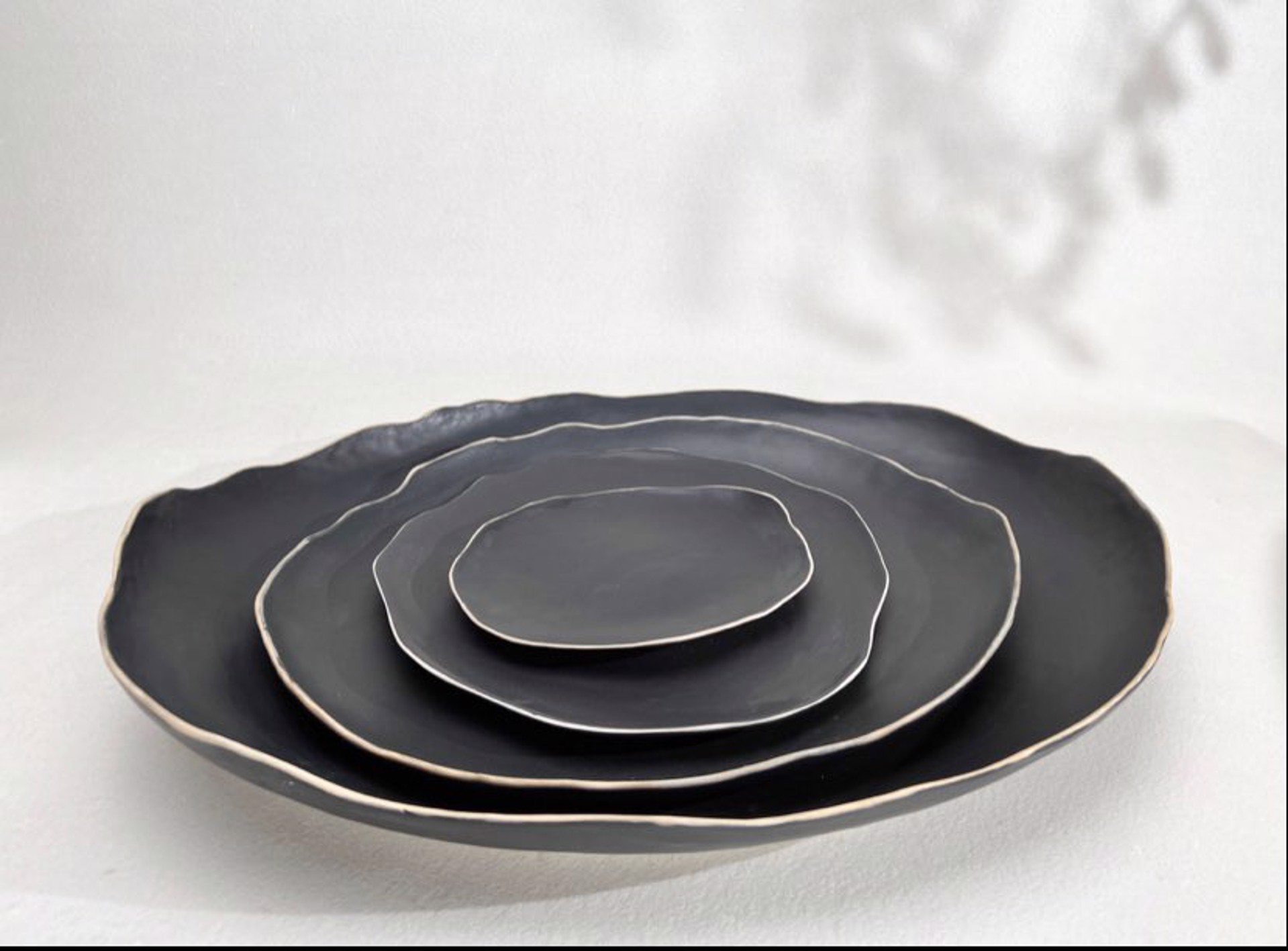 Black Nested Platters by Kate Tremel