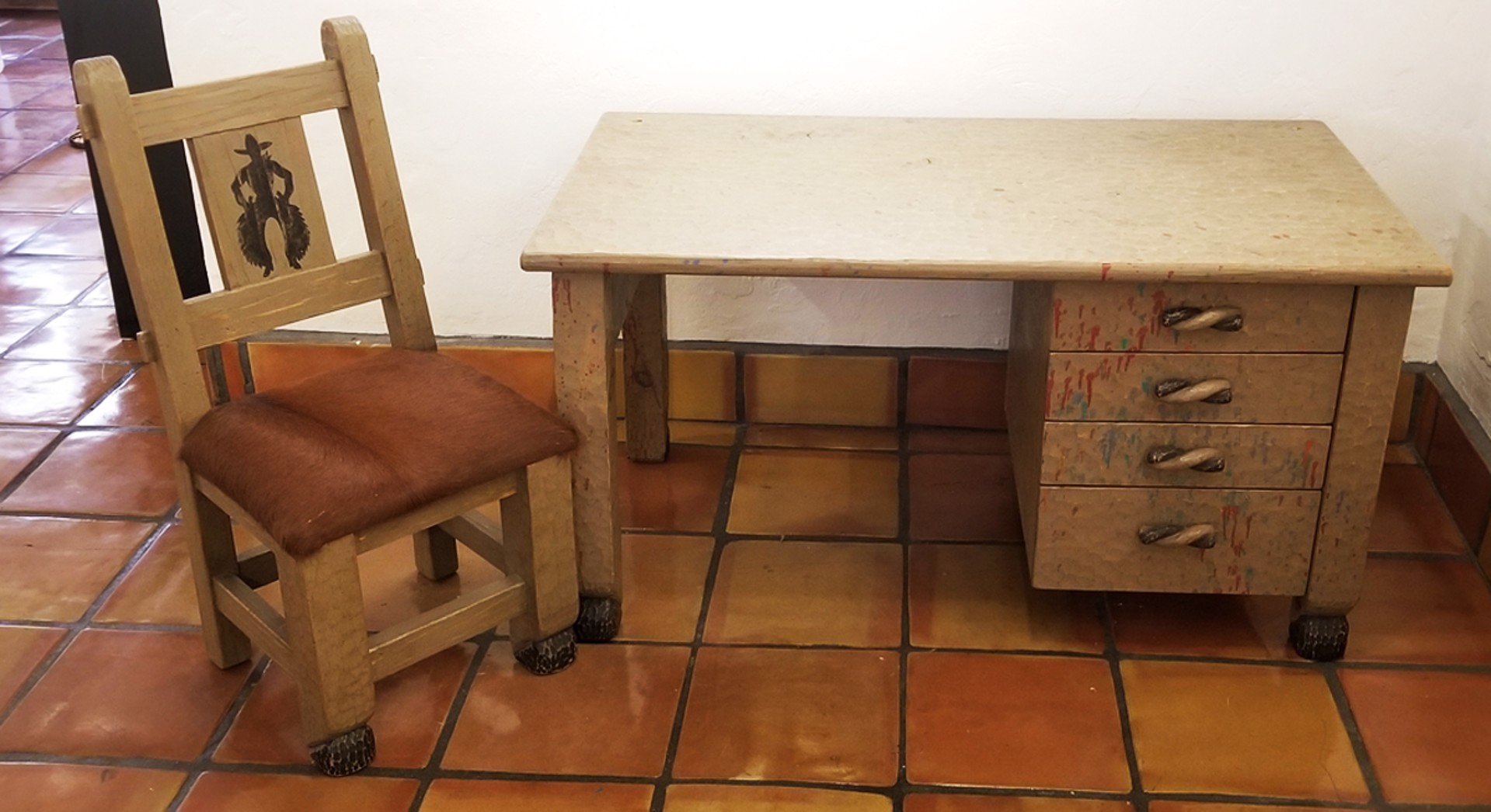 Child Desk and Cowhide Chair by L. D. Burke