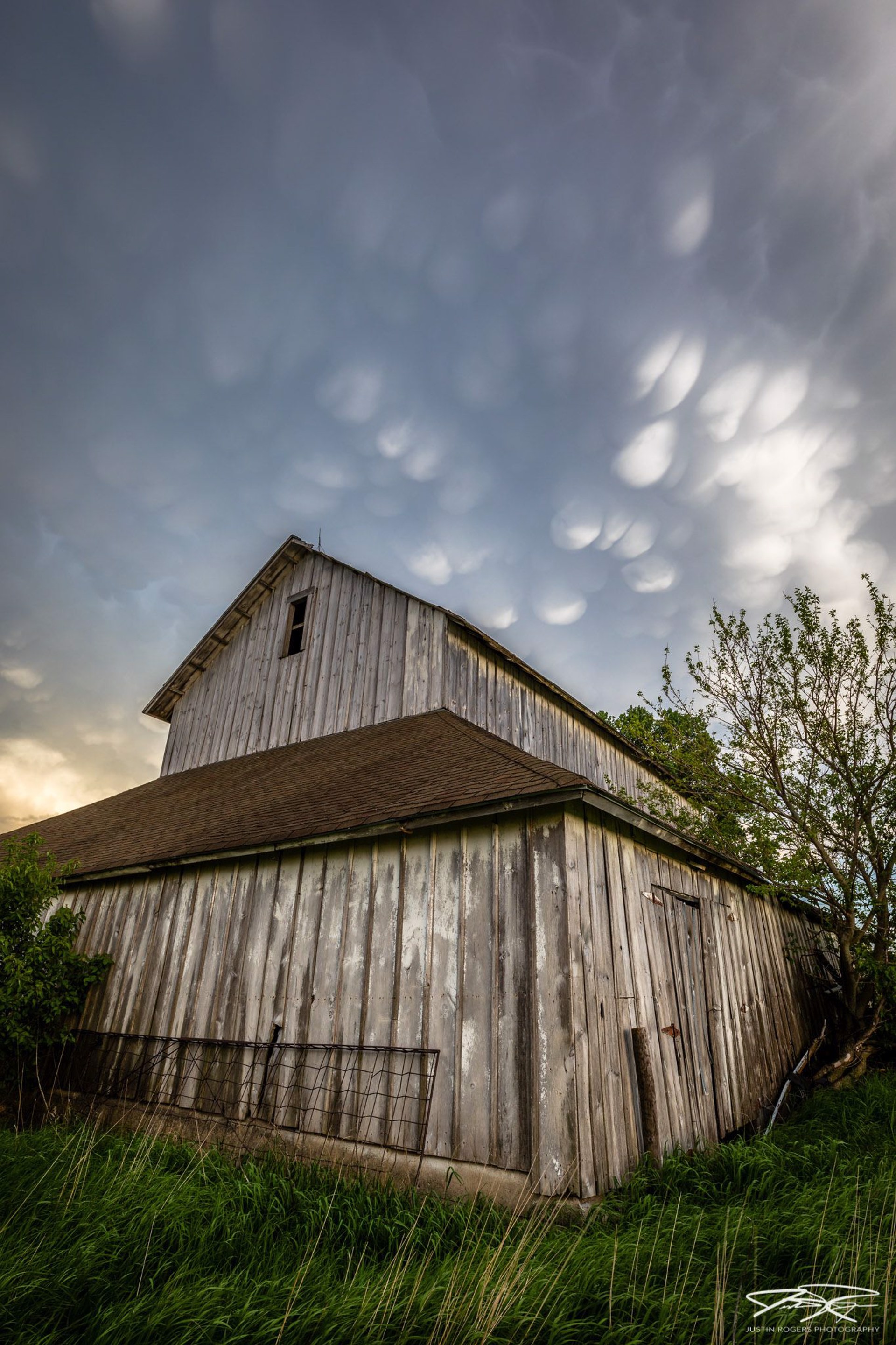 Mammatus Storm Clouds Barn by Justin Rogers
