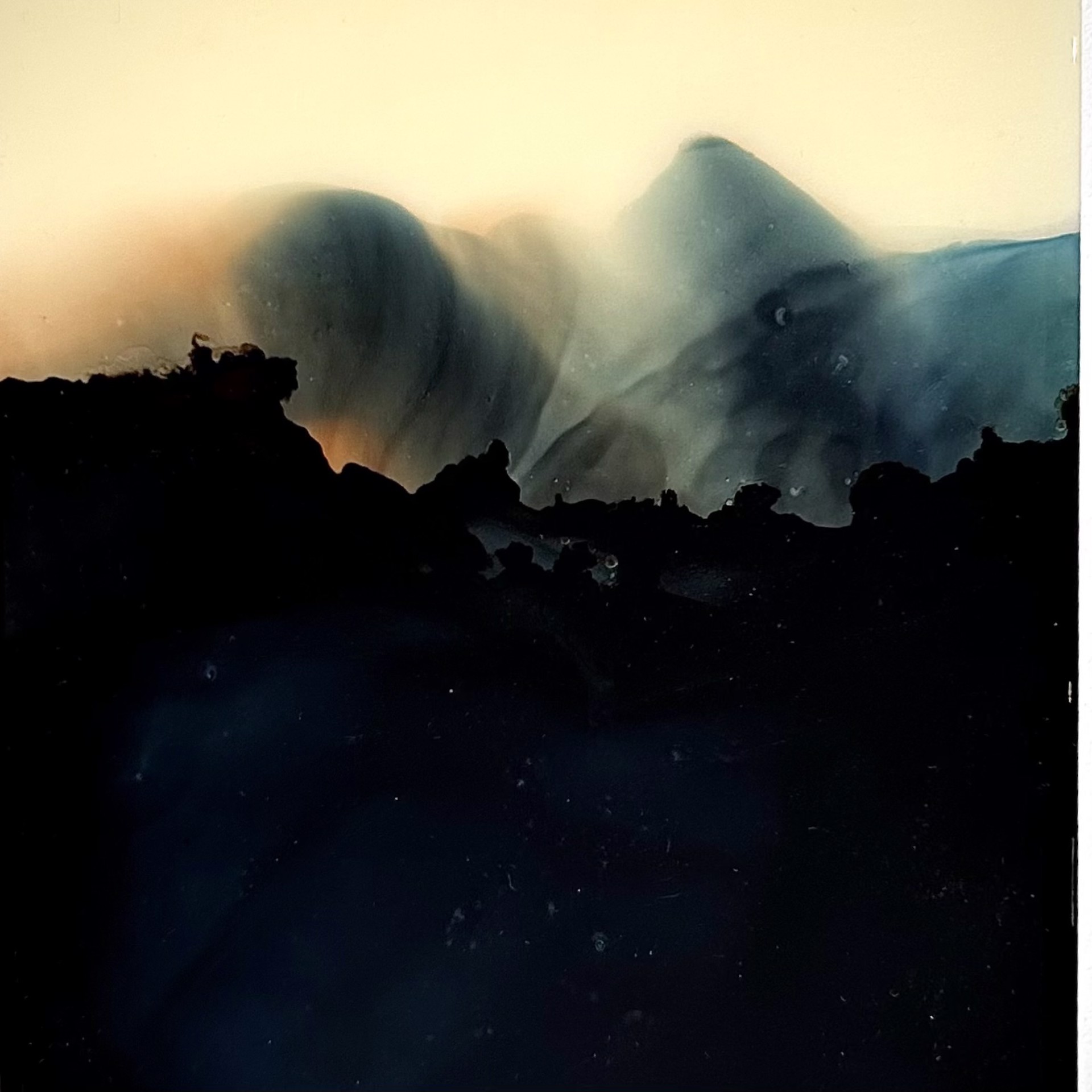 Cloudy Mountains by Marc De Grandmont