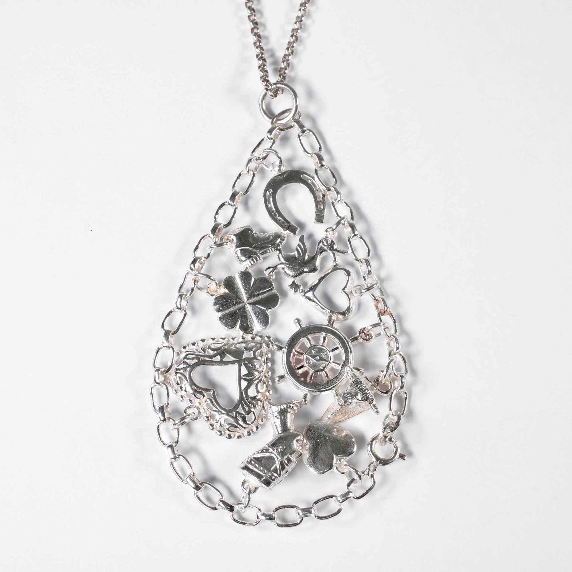 Wheel of Fortune Charm Bracelet Pendant by Amelia Toelke