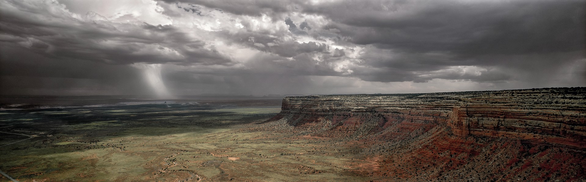 Thunderstorms Moving In, Top of Mokie Dugway, Route 261, Utah by Lawrence McFarland