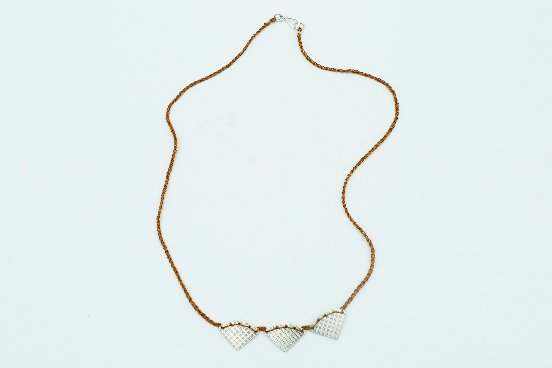 Necklace with Copper Colored Silk Thread by Erica Schlueter