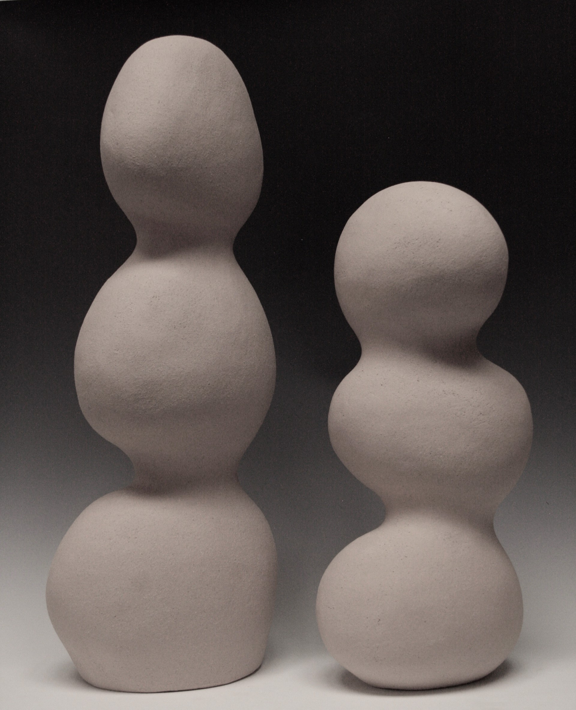 Pair of Segmented Totems by Peter St. Lawrence