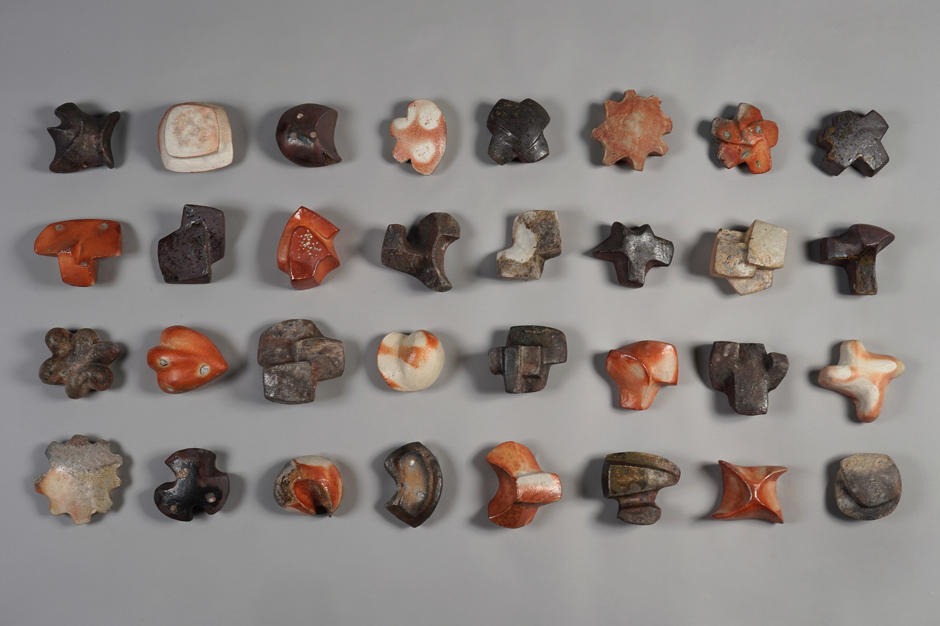 Petite Symbols with Mixed Patinas by Eric Knoche