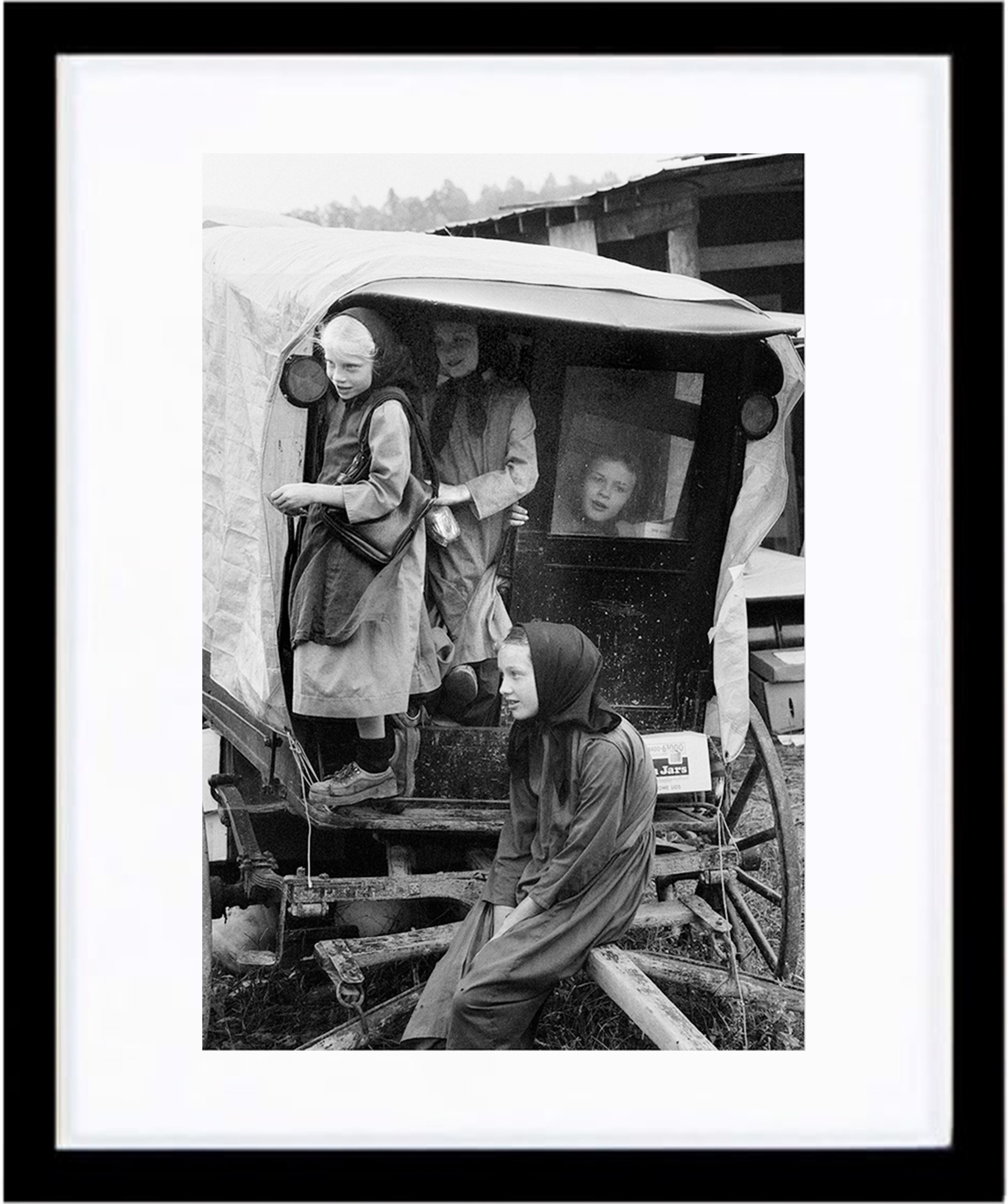 Mennonite Children Playing in Wagon by Don Dudenbostel