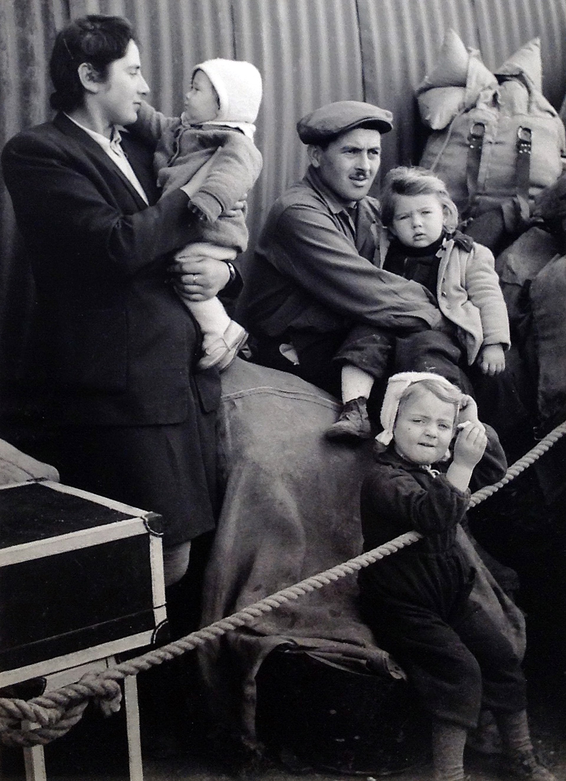 8. Family Waiting; Camp in Cyprus by Paula Kotis