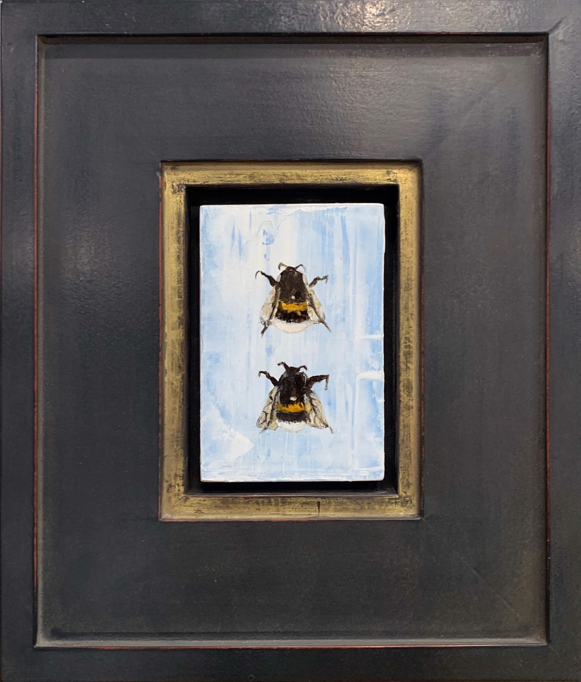 An Original Oil Painting Of Two Bees With An Abstract Blue Background With A Black And Gold Frame, By Jenna Von Benedikt