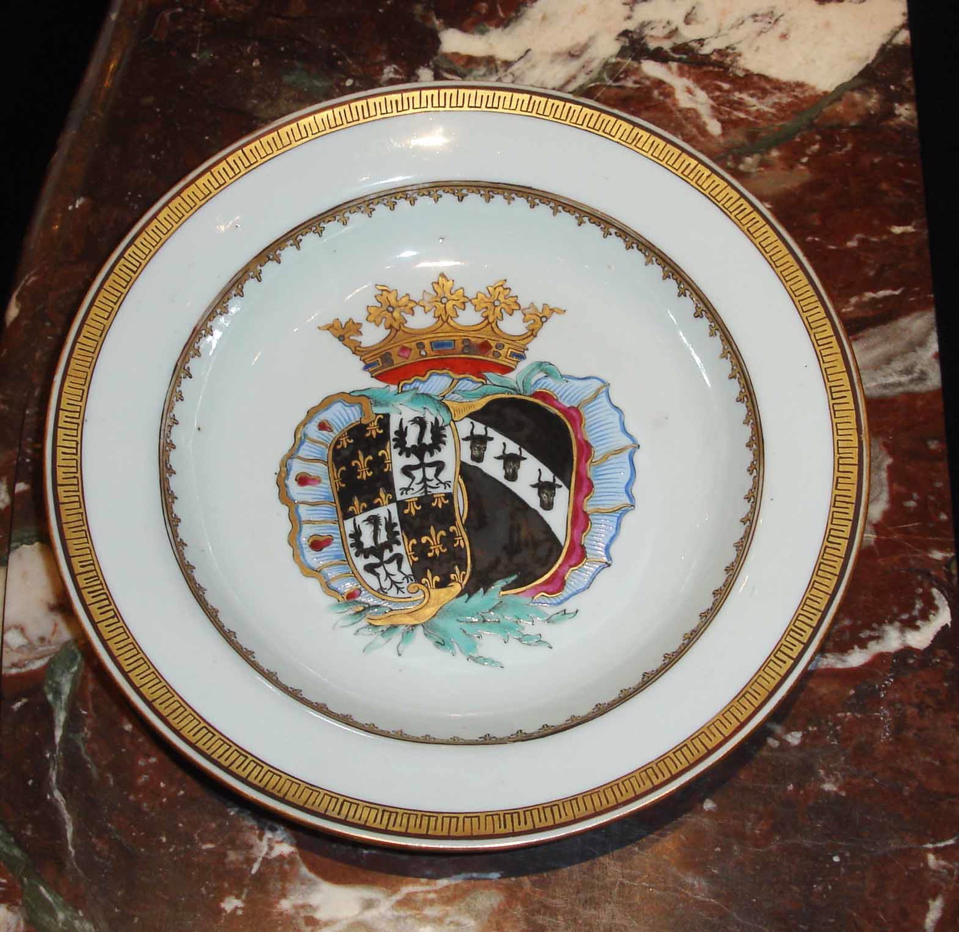 SET OF 11 ARMORIAL SOUP-PLATES FOR THE DUTCH MARKET WITH ARMS OF DE FAMARS AND VRIESEN
