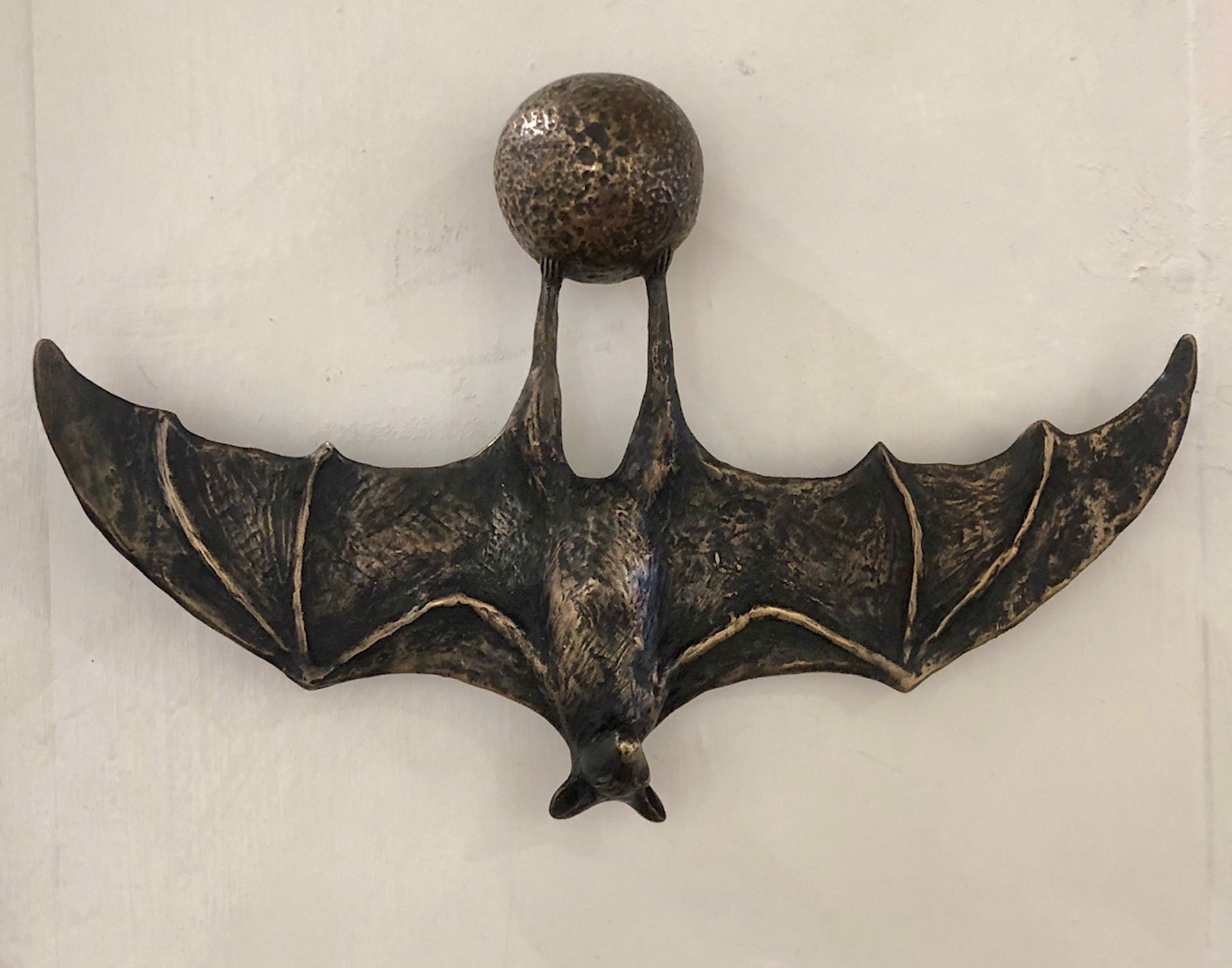 Bat on a Ball, brown by Copper Tritscheller