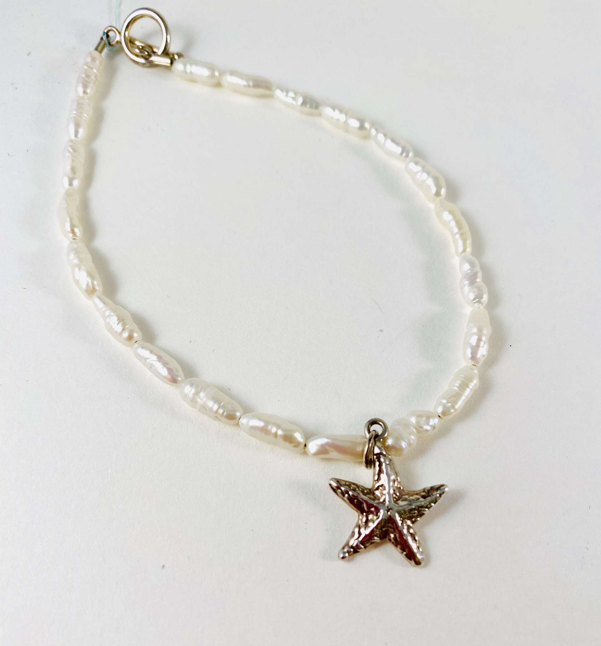 White Pearl Bracelet, small starfish charm (ss) P13 by Nance Trueworthy