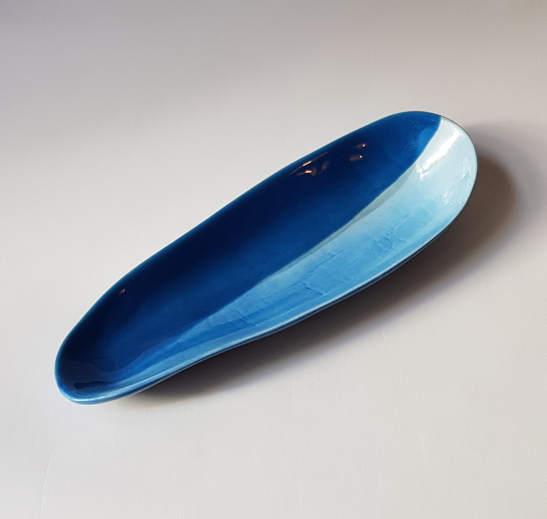 Ceramic vessel "Barque Bleue" by Claire de Lavallee