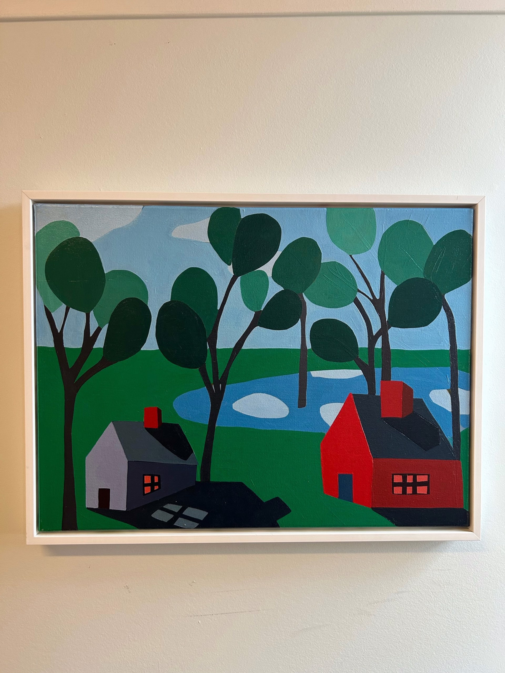 Red House and Gray House in Forest with Lights On by Sage Tucker-Ketcham