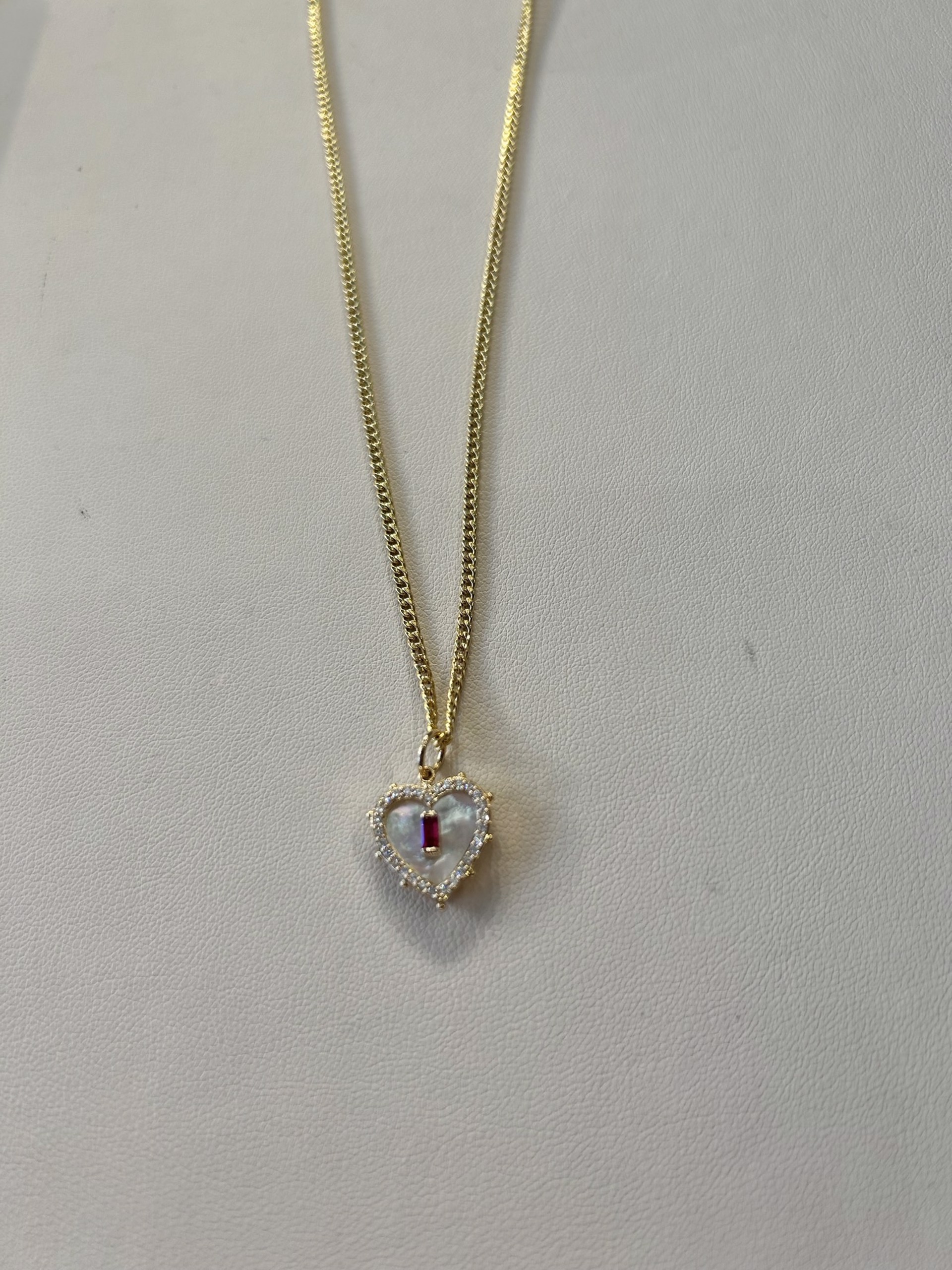 KB-N15 14k Gold Necklace with gold diamond and pearl heart pendant with a ruby baguette by Karen Birchmier