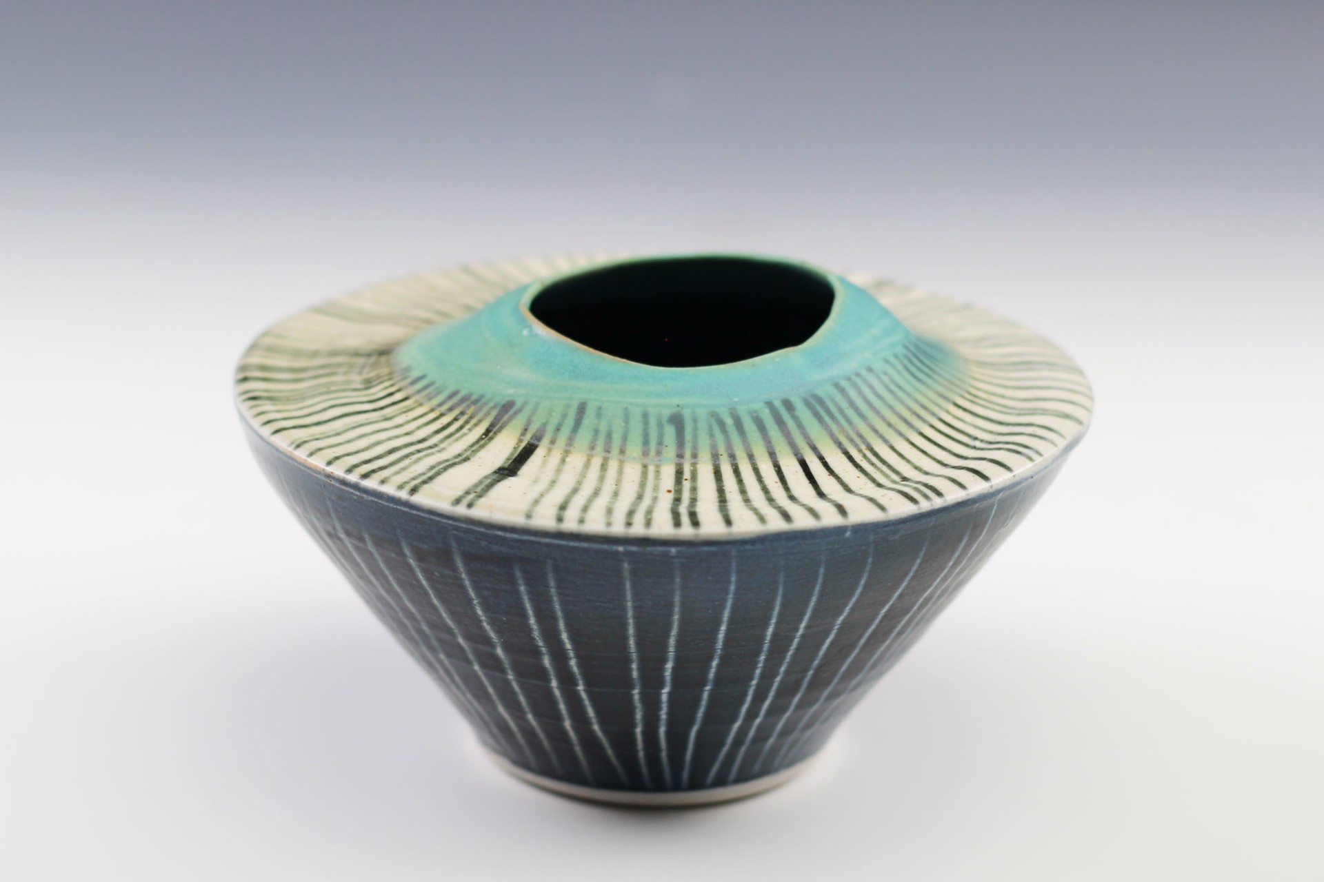 Double Rim Vase by Delores Fortuna