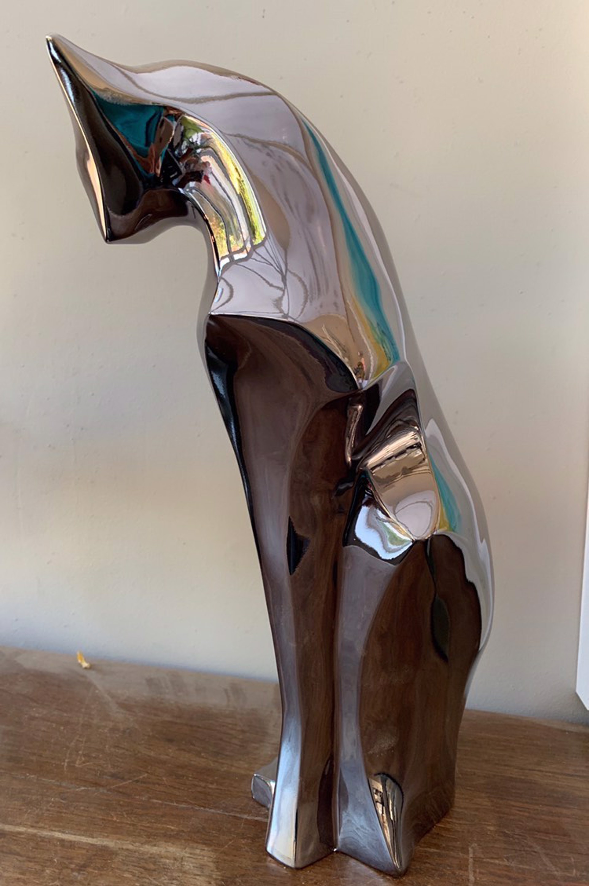 Black Chrome Cat Sitting by Marie Ackers