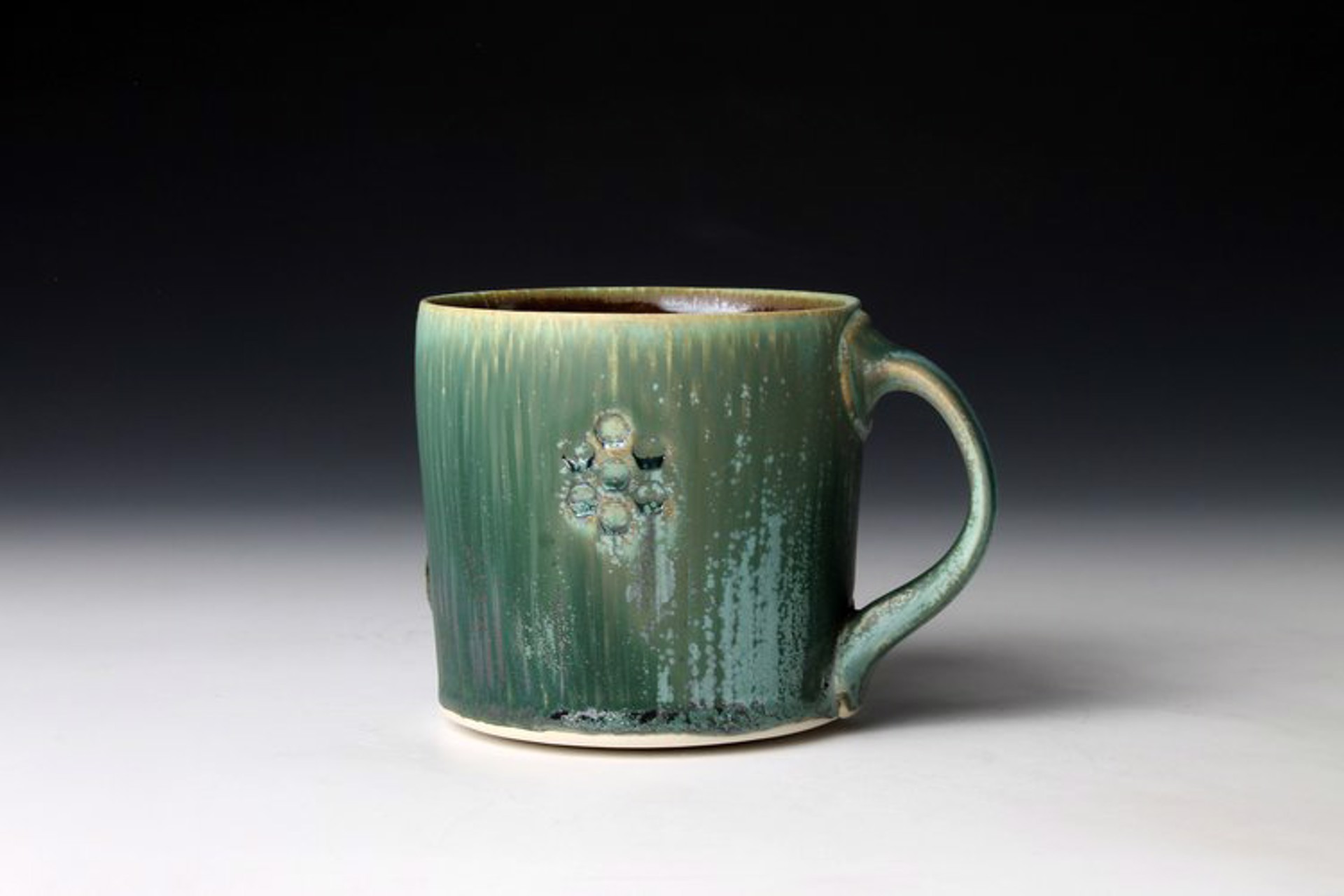 Round Green Mug by Nick DeVries