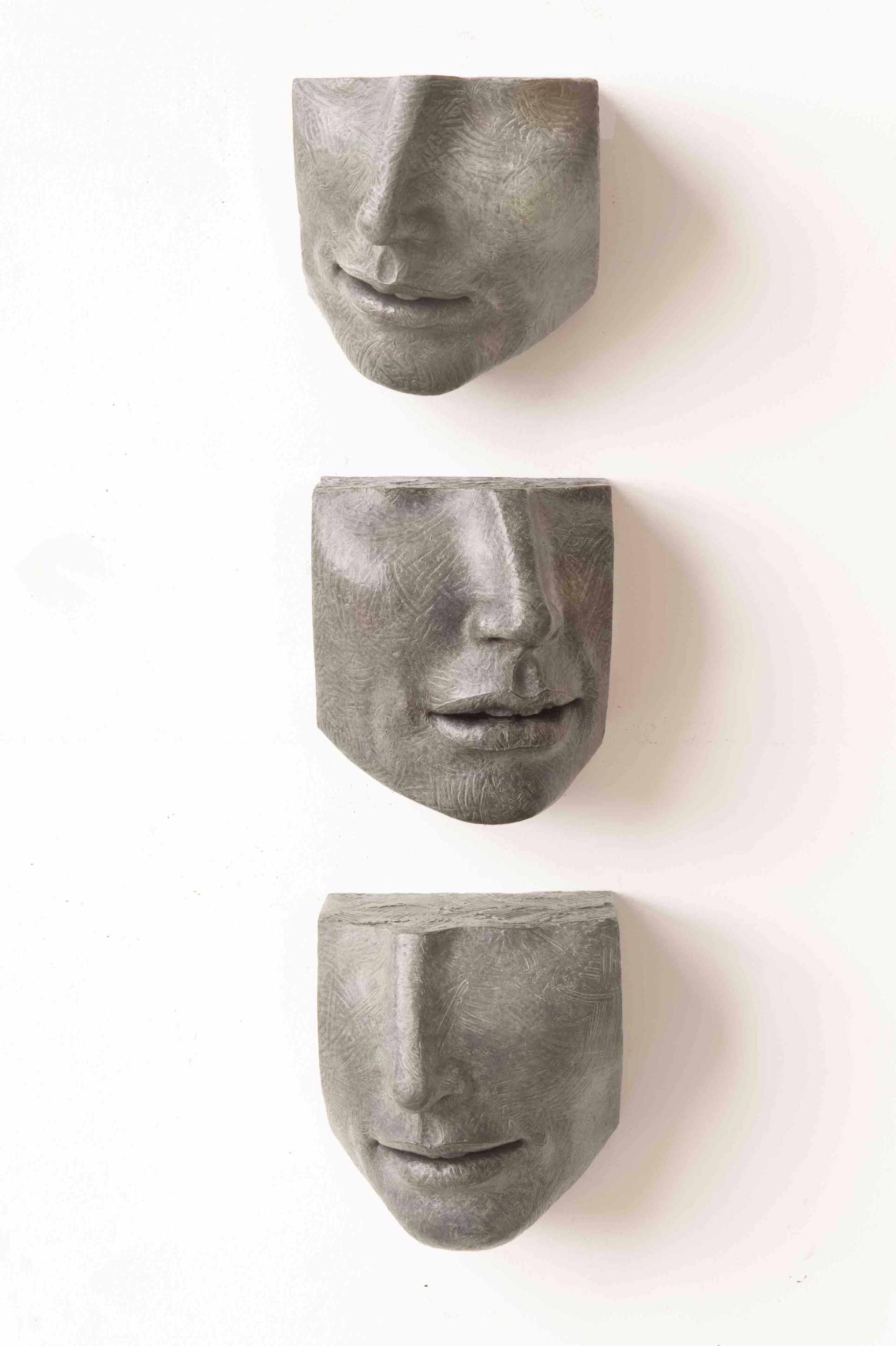 Small Face Fragments VII, VIII, IX by Susan Stamm Evans