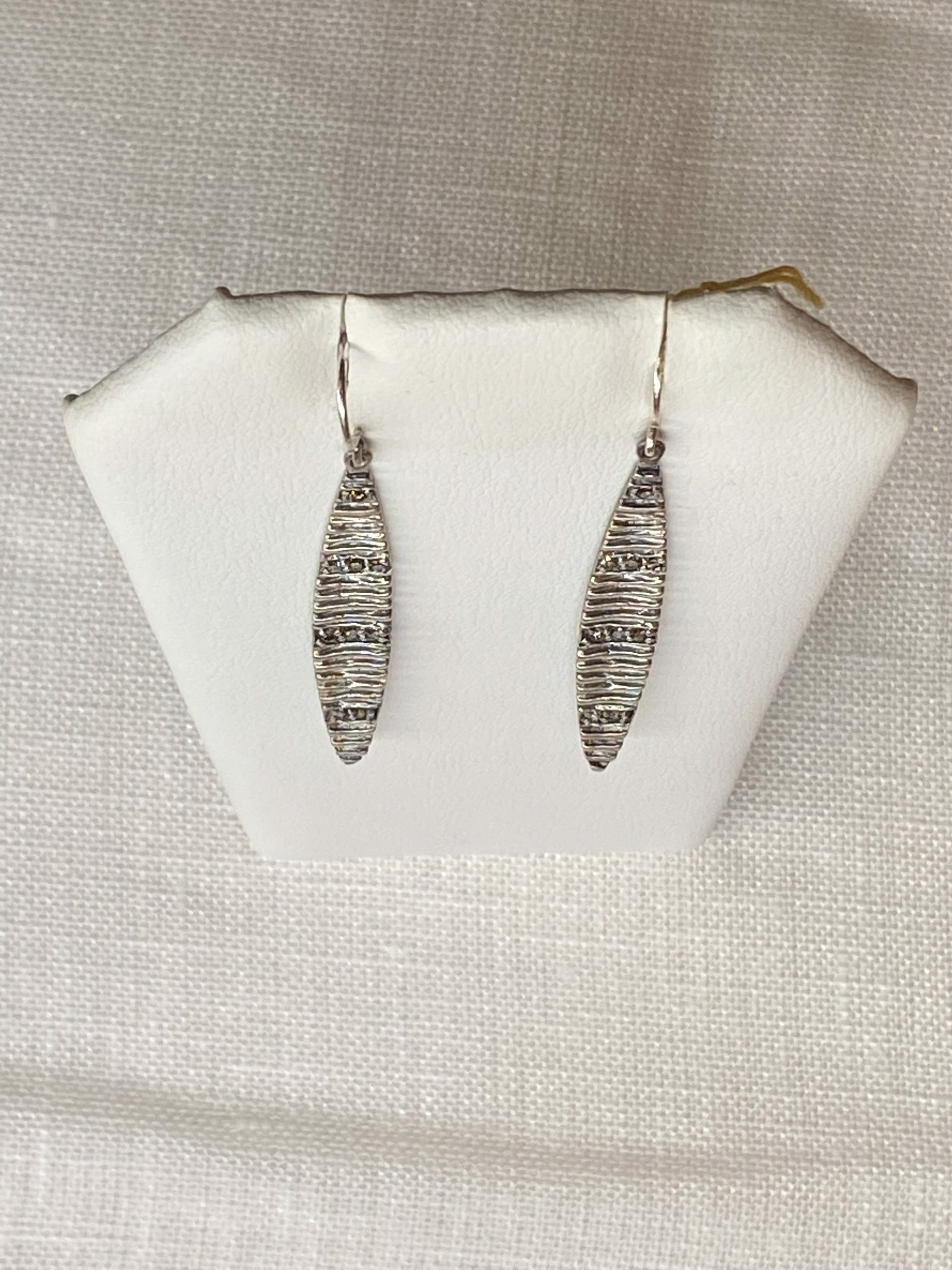 Faceted diamond drop earrings by Jeri Mitrani