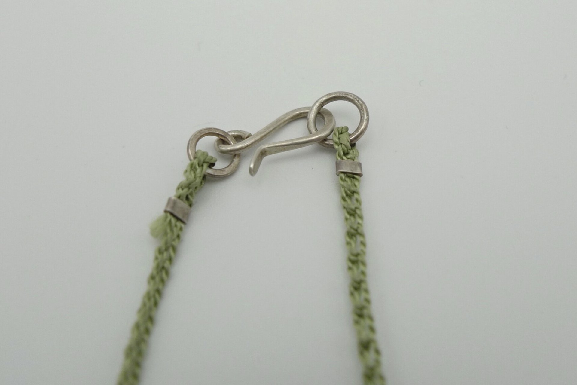 Necklace with Green Silk Thread by Erica Schlueter