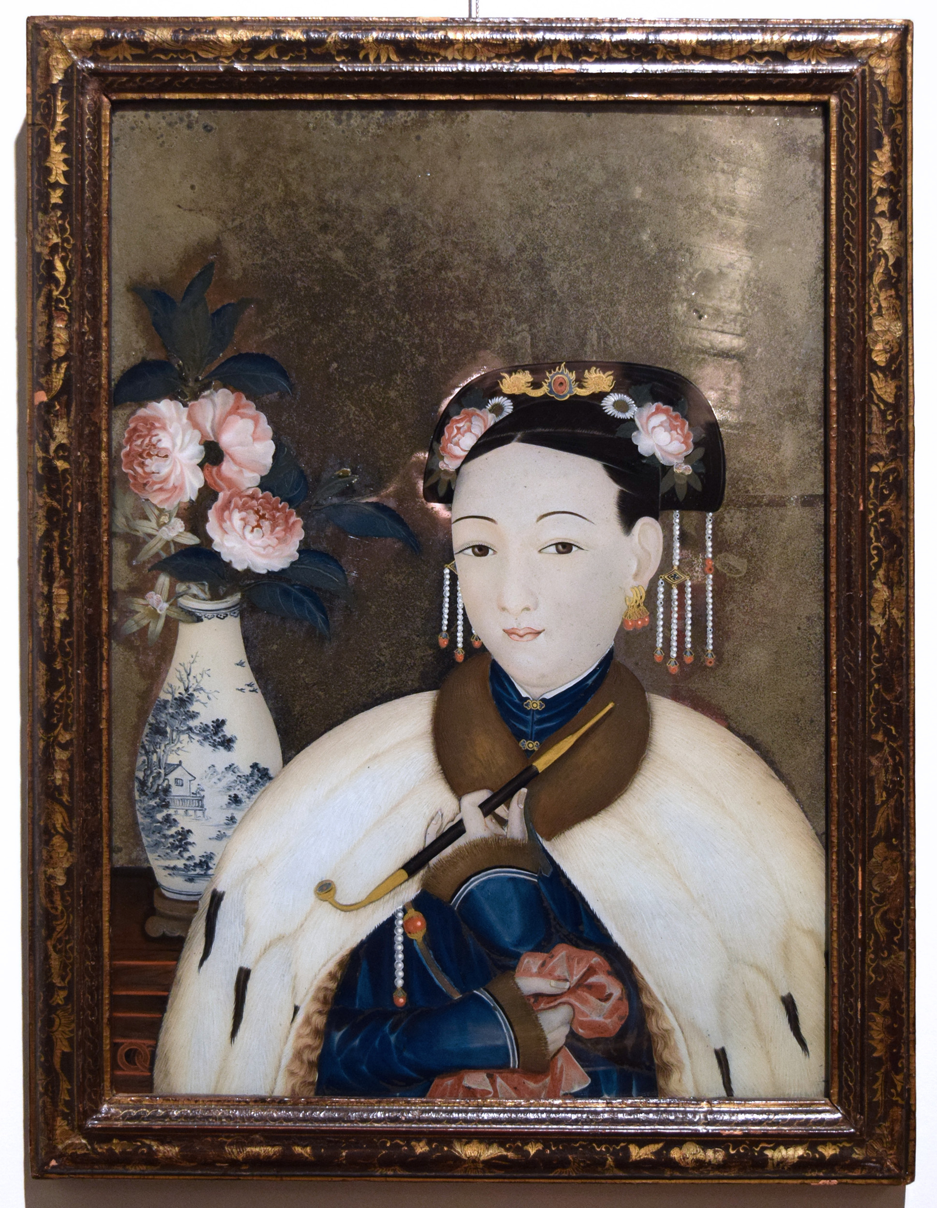 REVERSE PAINTING ON MIRRORED GLASS, A LADY WITH PIPE