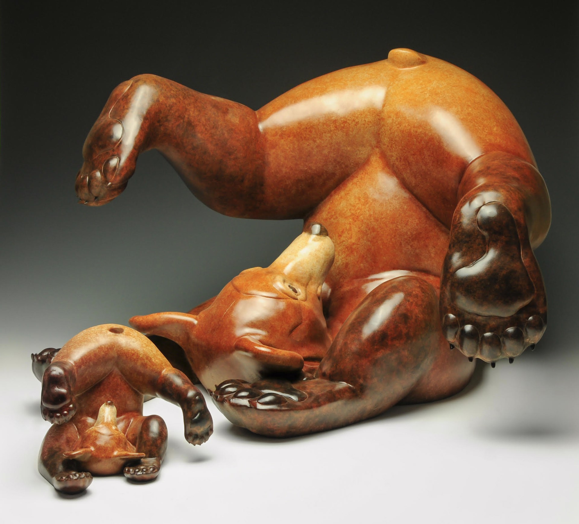 Bronze Sculpture Featuring A Somersaulting Grizzly Bear Cub