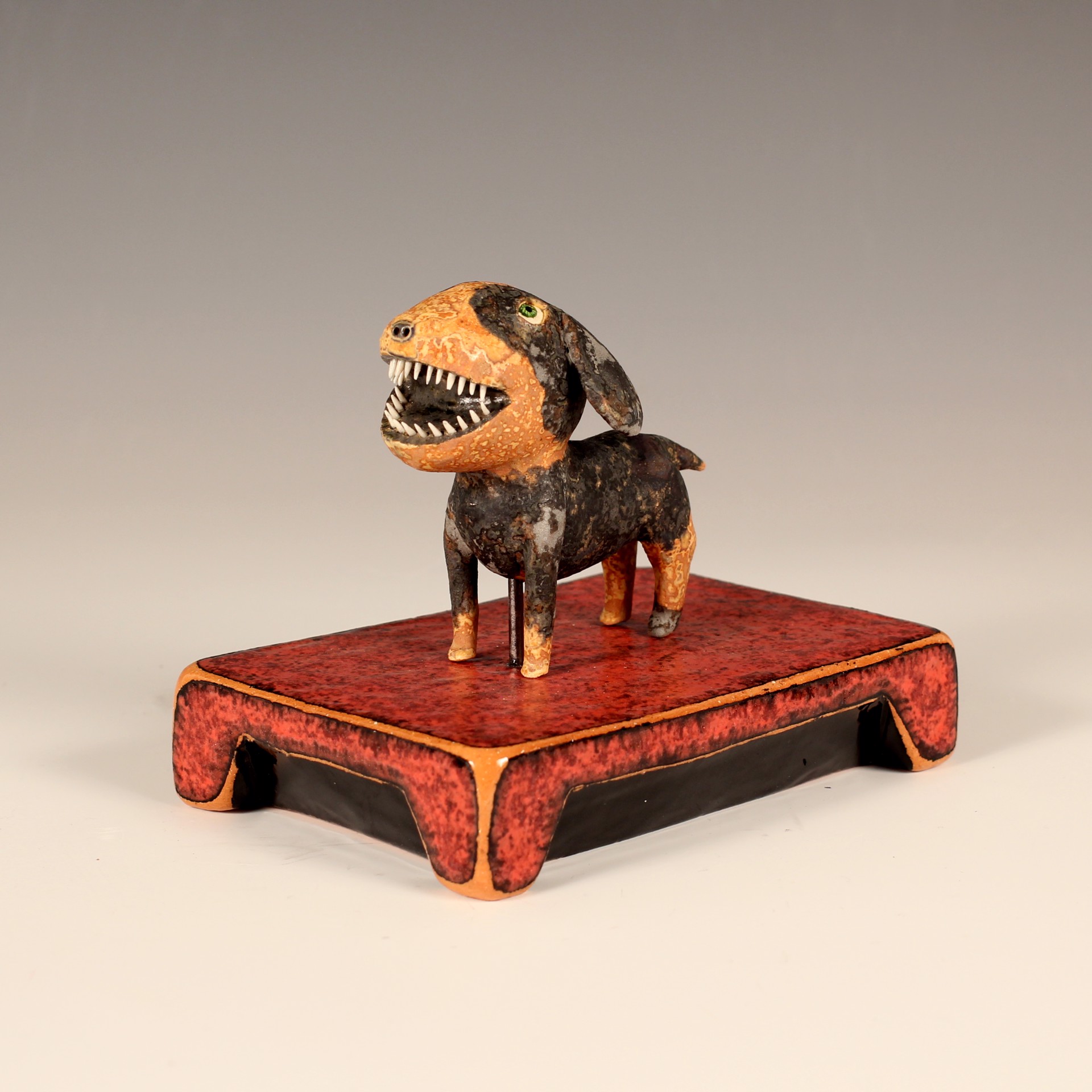 Red & Black Dog on Red Base by Wesley Anderegg