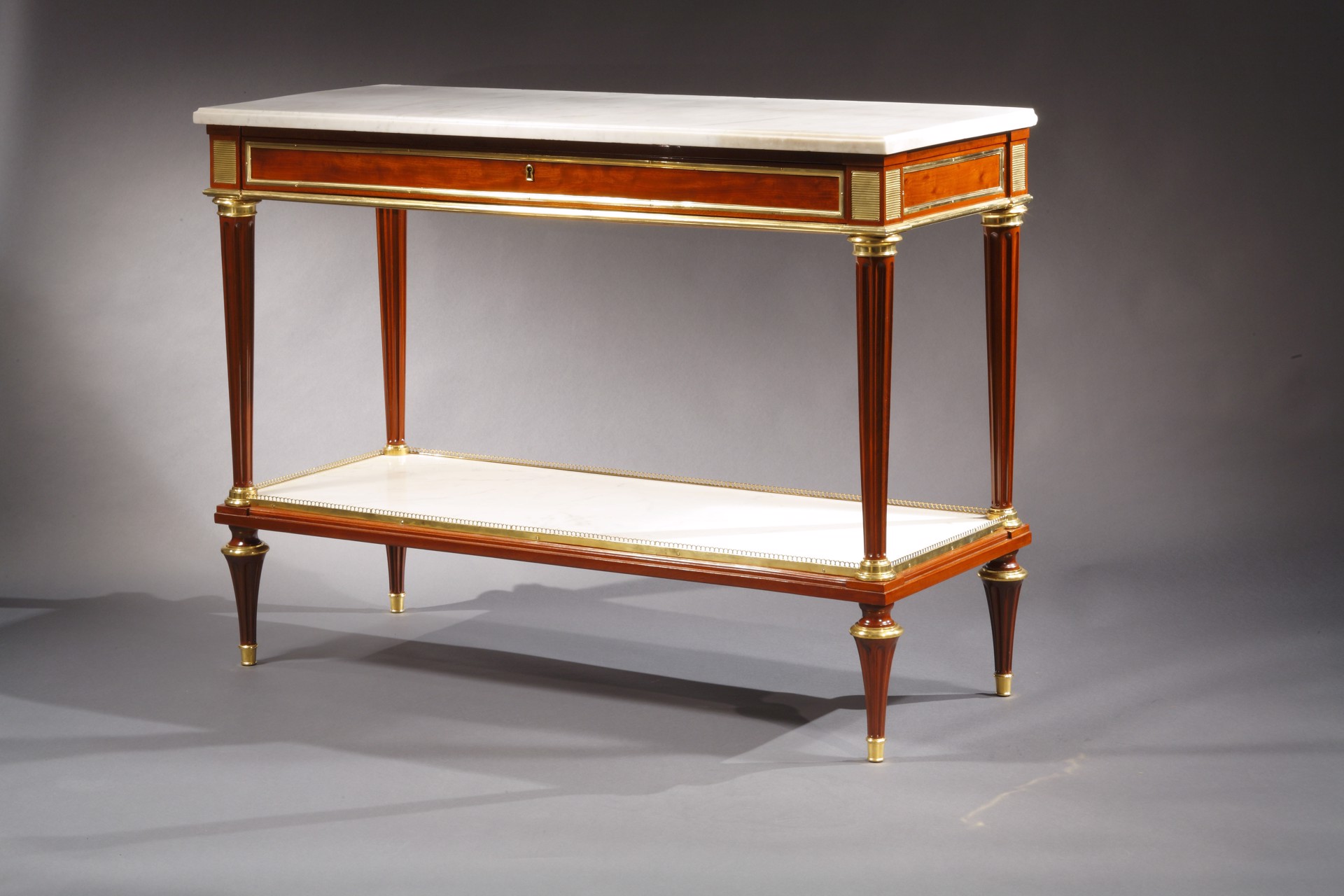 PAIR OF LOUIS XVI MAHOGANY MARBLE TOP CONSOLES ATTRIB. TO WEISWEILER by Adam Weisweiler