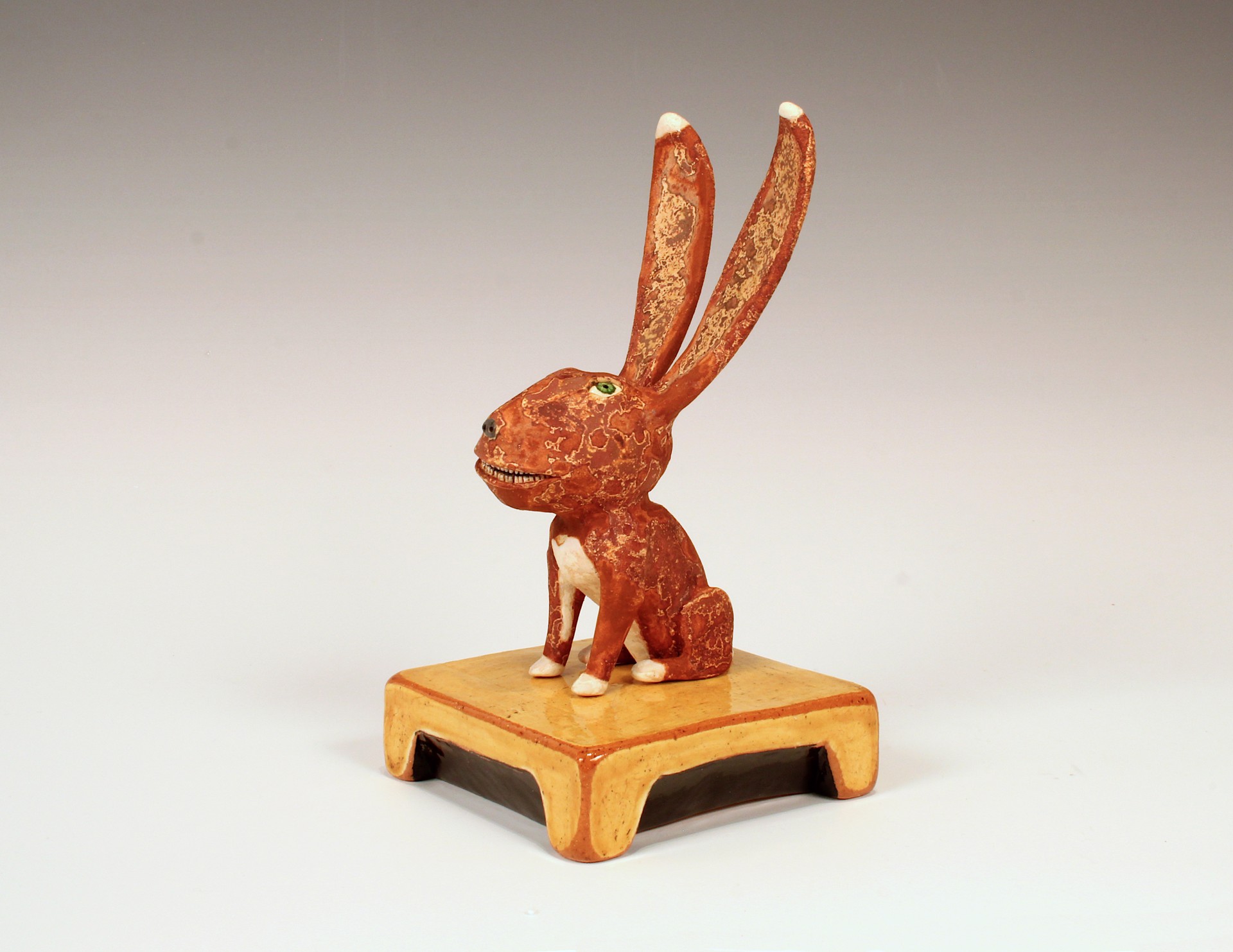 Red Rabbit on Yellow Base by Wesley Anderegg