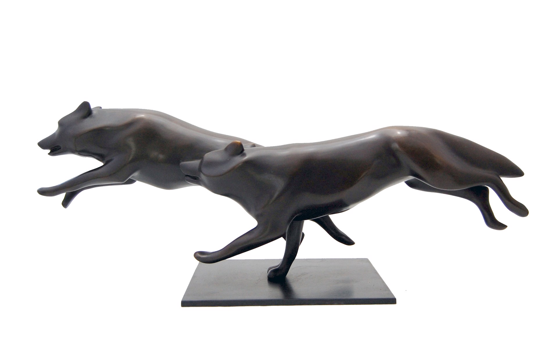 Fine Art Bronze Sculpture Of Two Wolves Running Next To Each Other With Contemporary Silver Patina, By Kristine Taylor