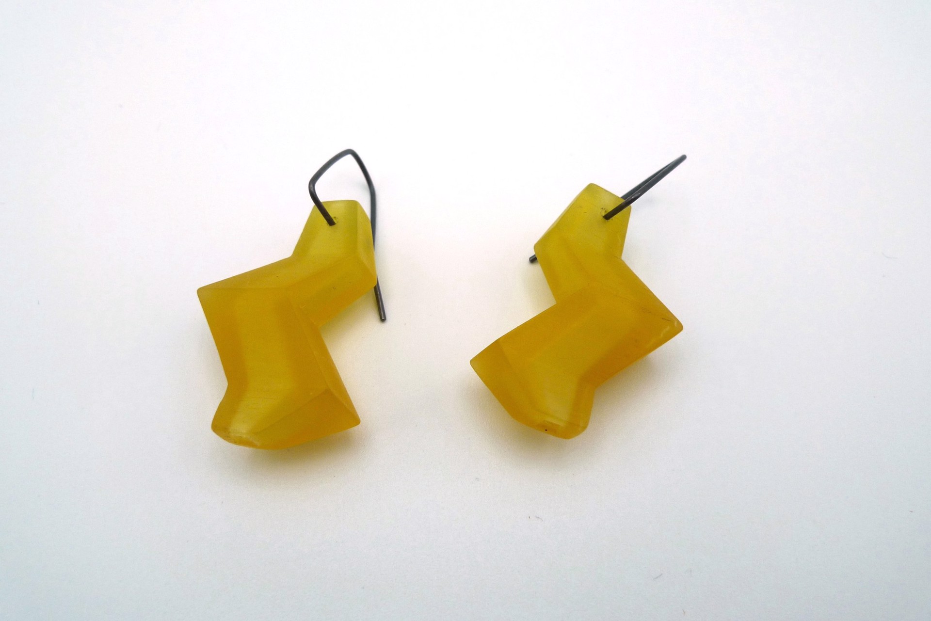 Earrings by Juan Fried