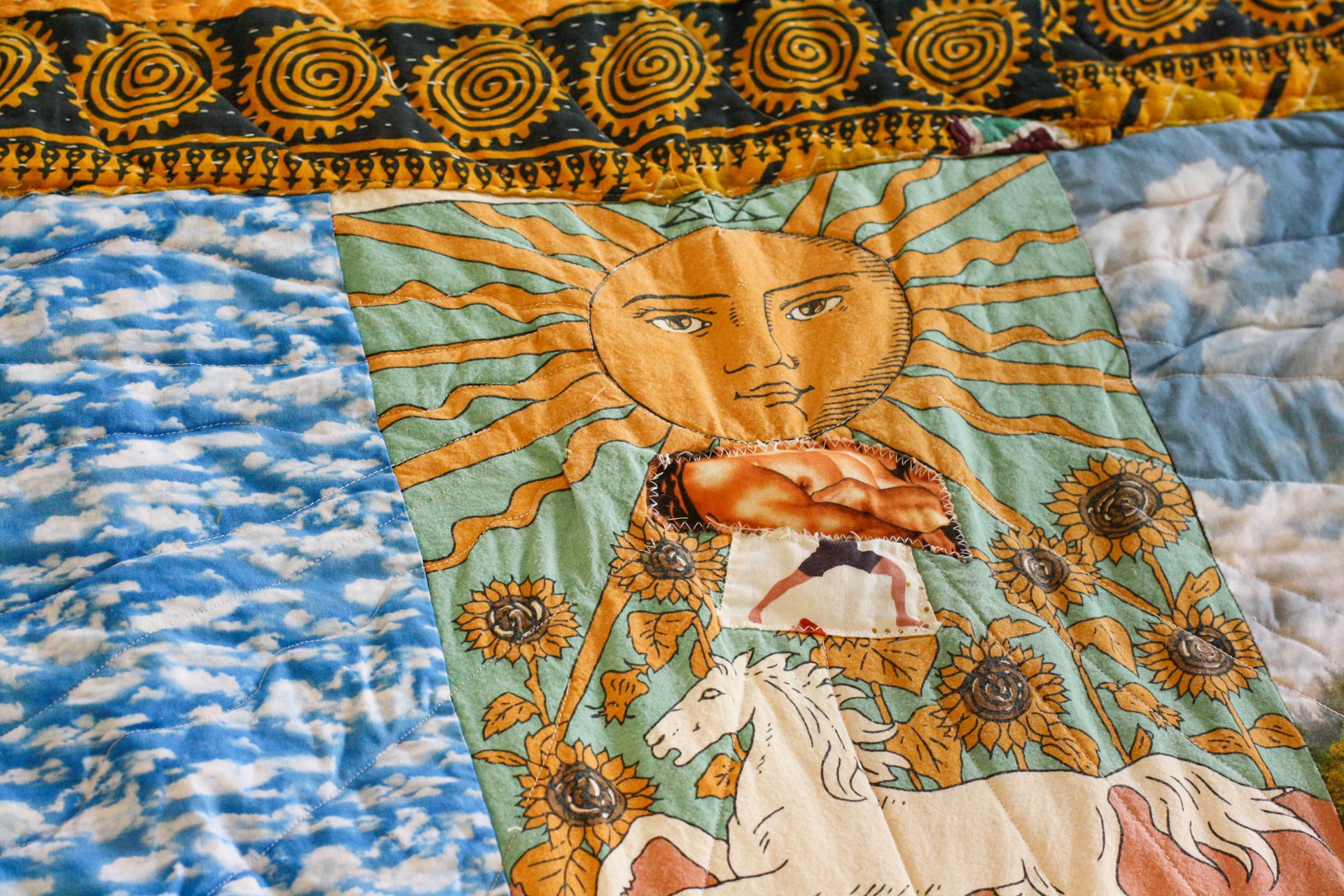 Mary Comforts the Grieving and Dying with a Mini Quilt by Lauren Gregory