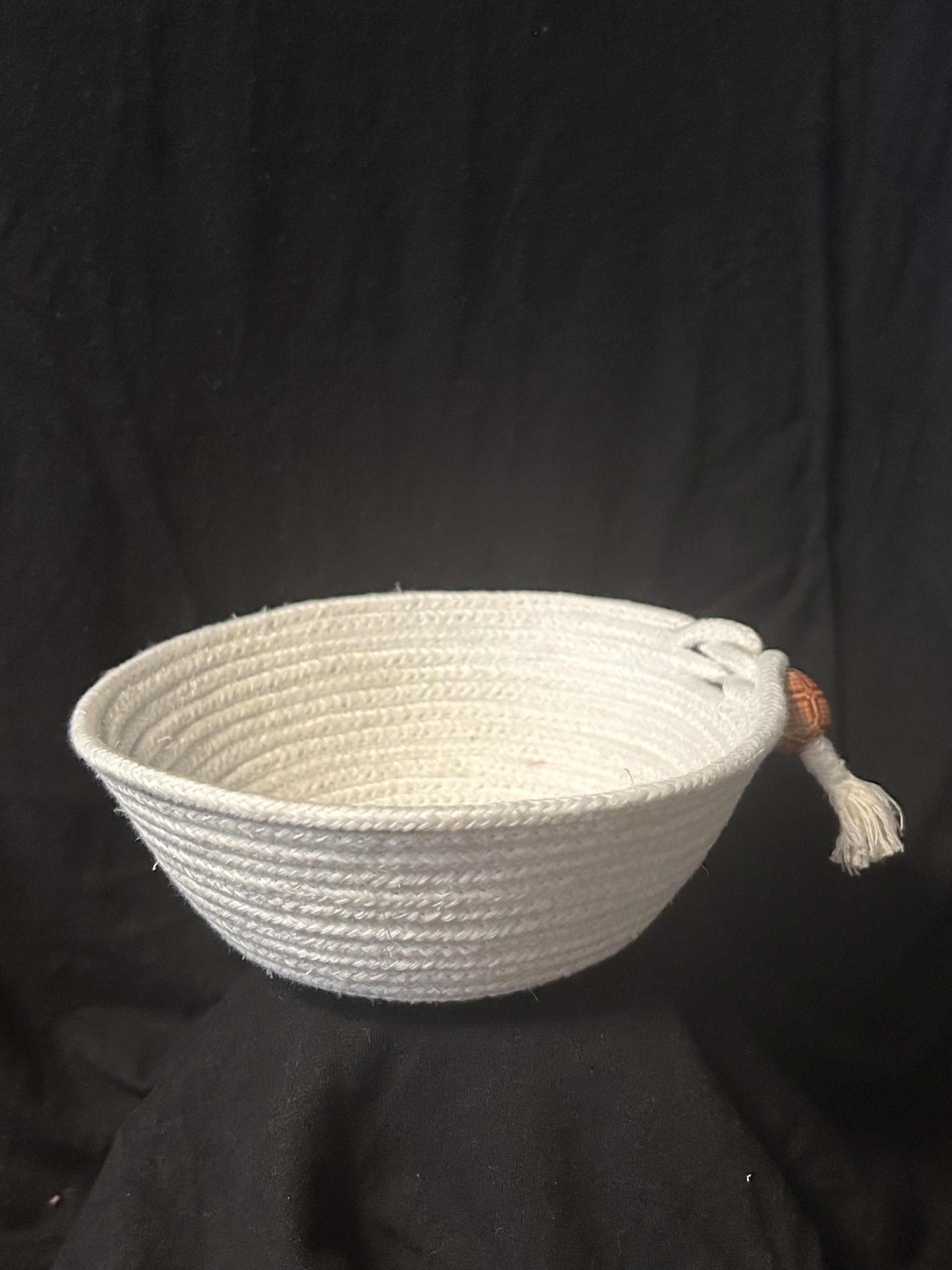 Small white bowl with bead by Patricia Wilson