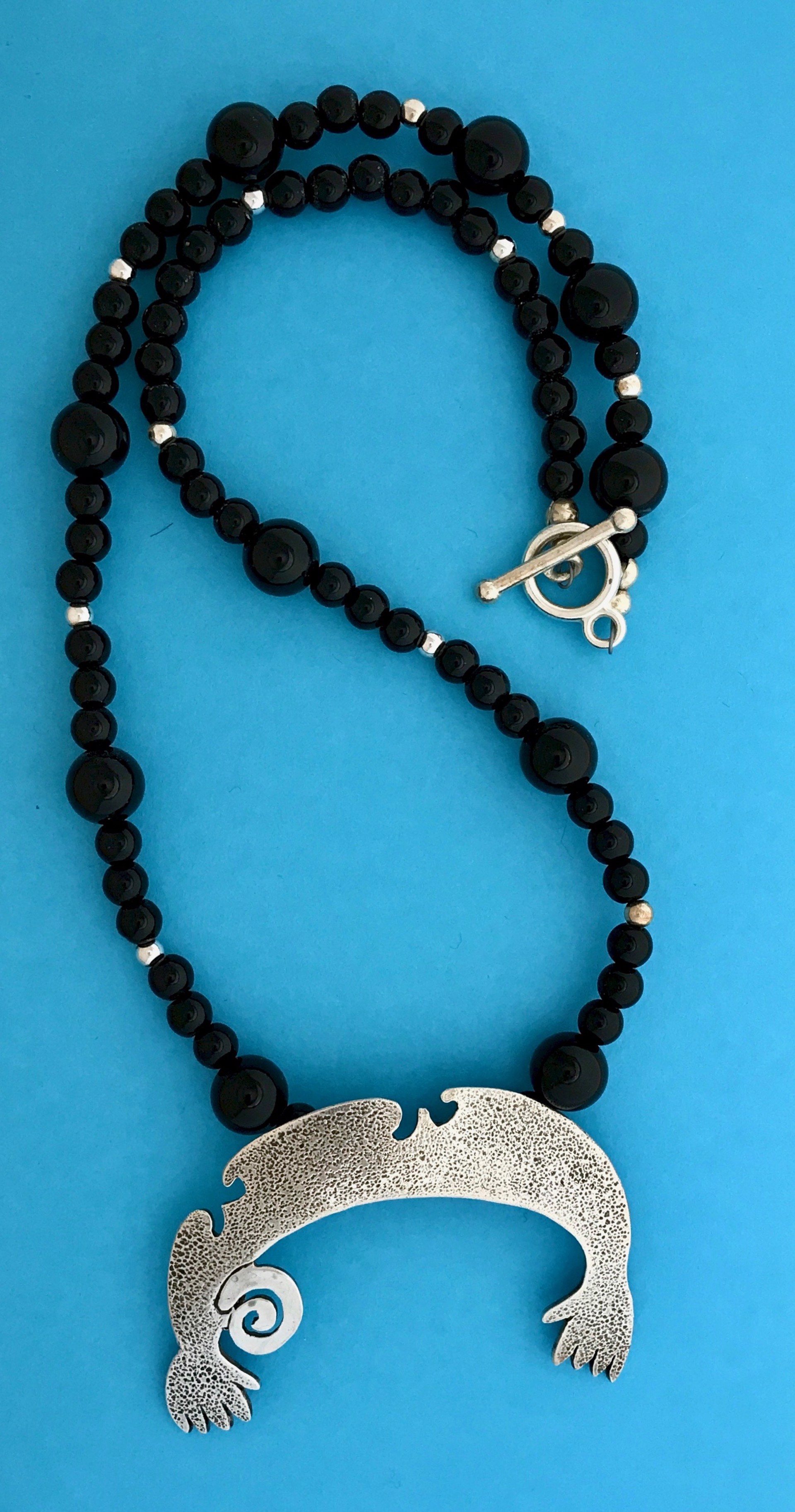 Helping hands Naja with silver and onyx beads by Melanie Yazzie