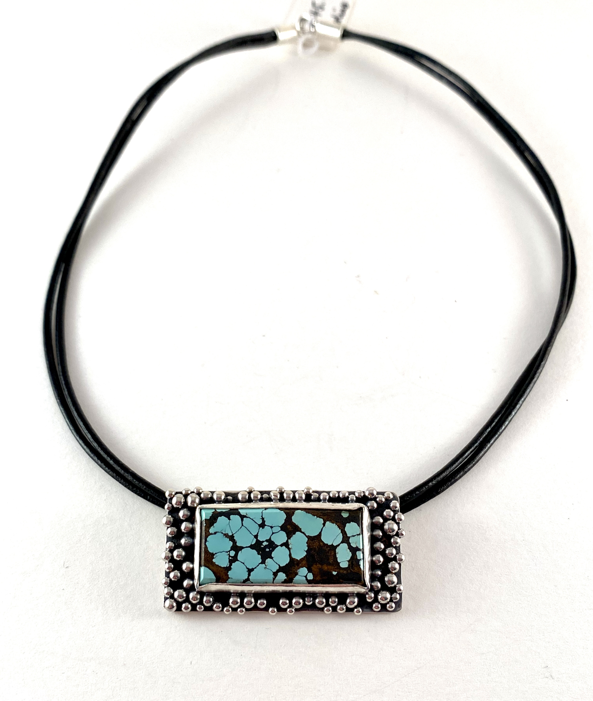 #131 Silver, Turquoise Pendant on double leather cord by Anne Bivens