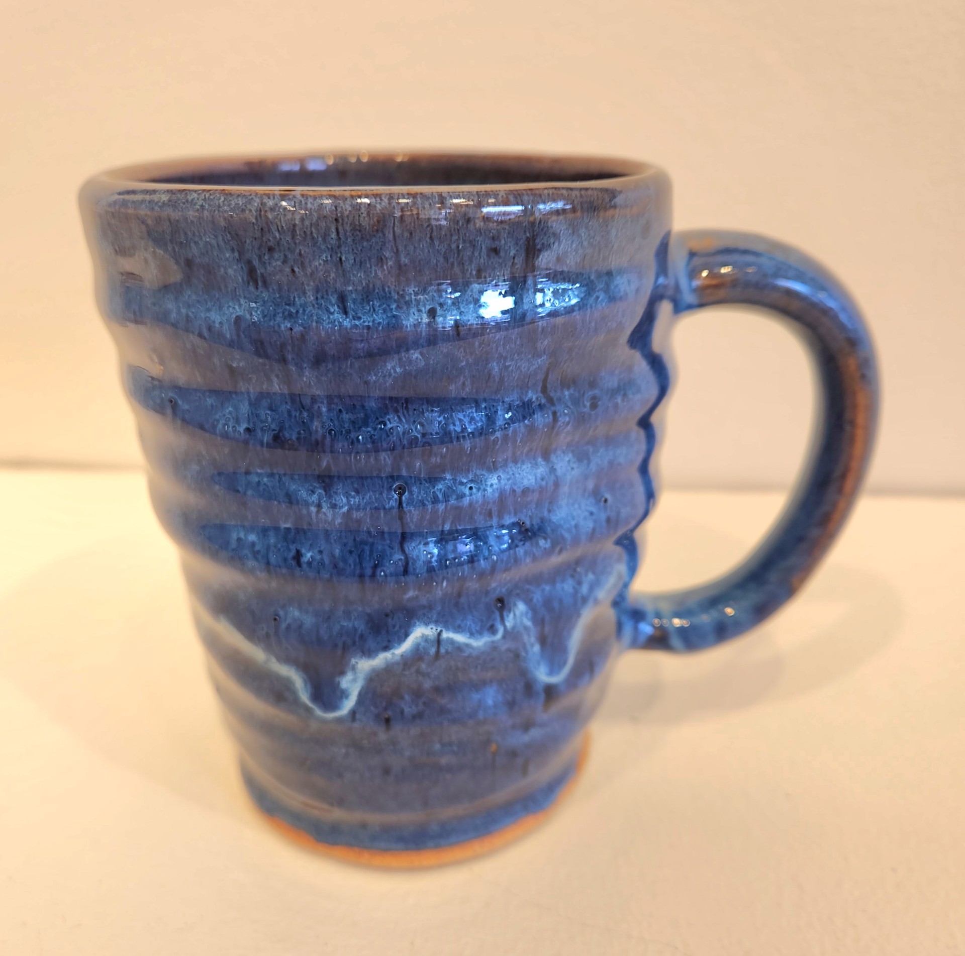 Mug, floating blue by Monica Plank