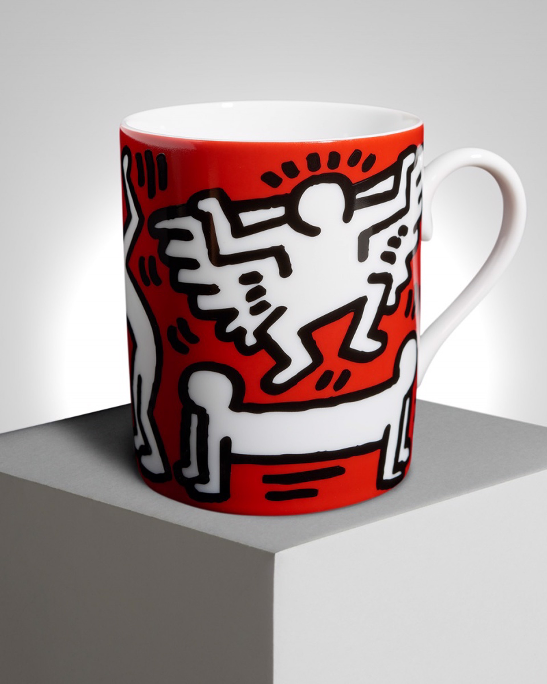 White On Red Mug by Keith Haring
