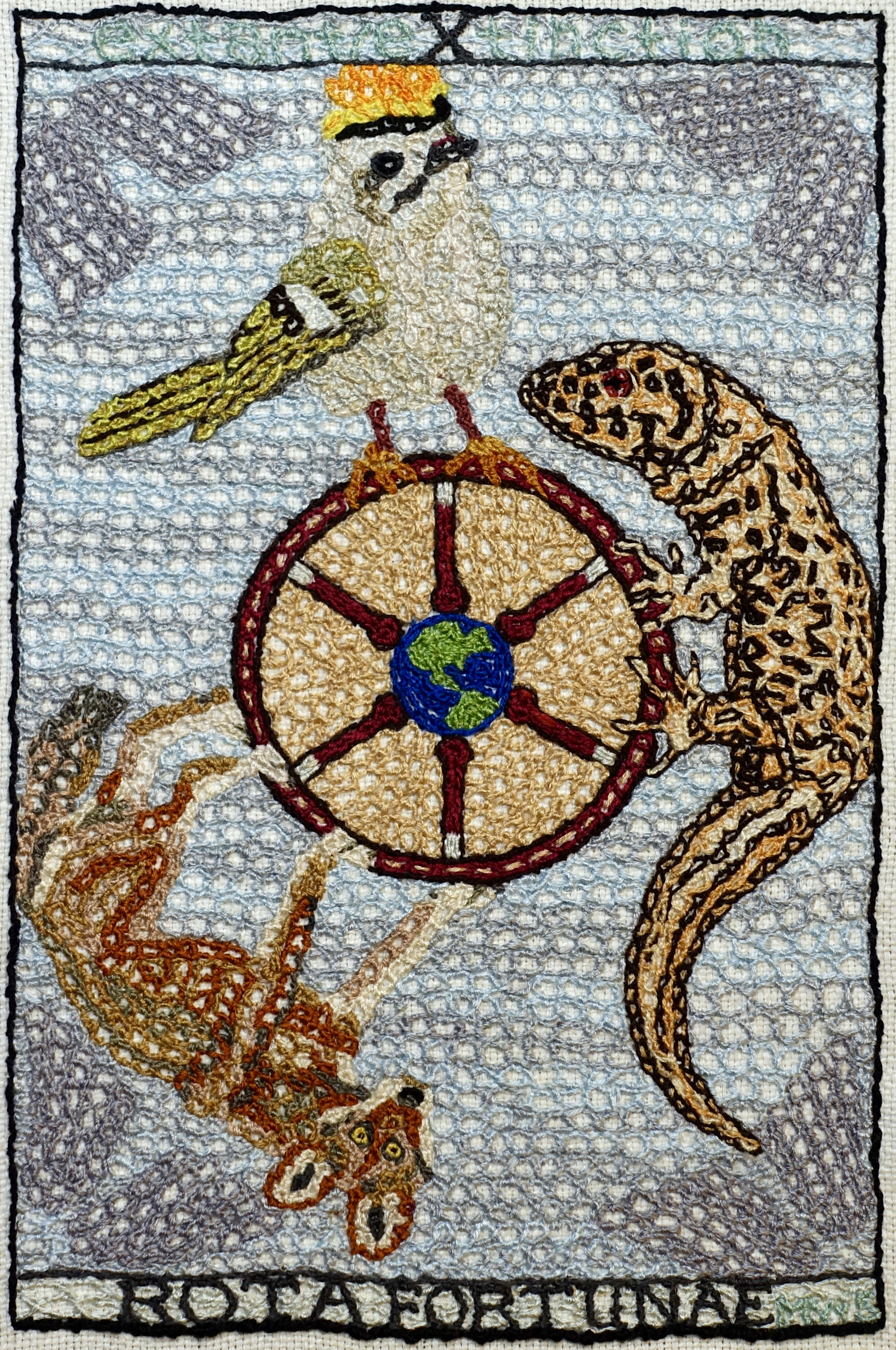 "Rota Fortunae: Extant/Extinction" by Martha Shade is a "stitch-work painting" depicting the 6th extinction, interpreted as the Wheel of Fortune tarot card