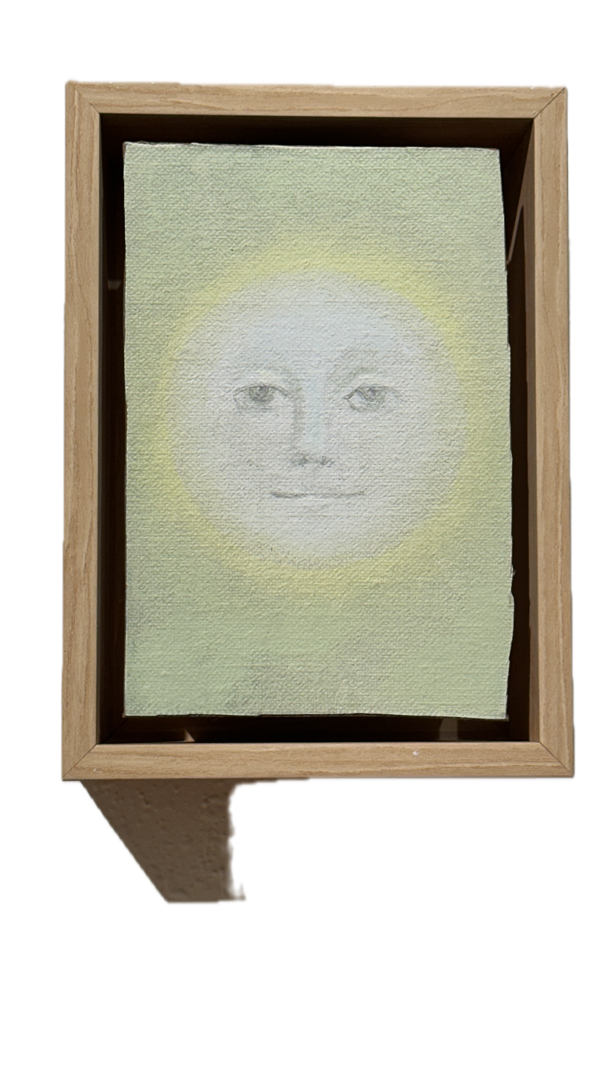 Moonface - pale grey against yellow by Leila McConnell
