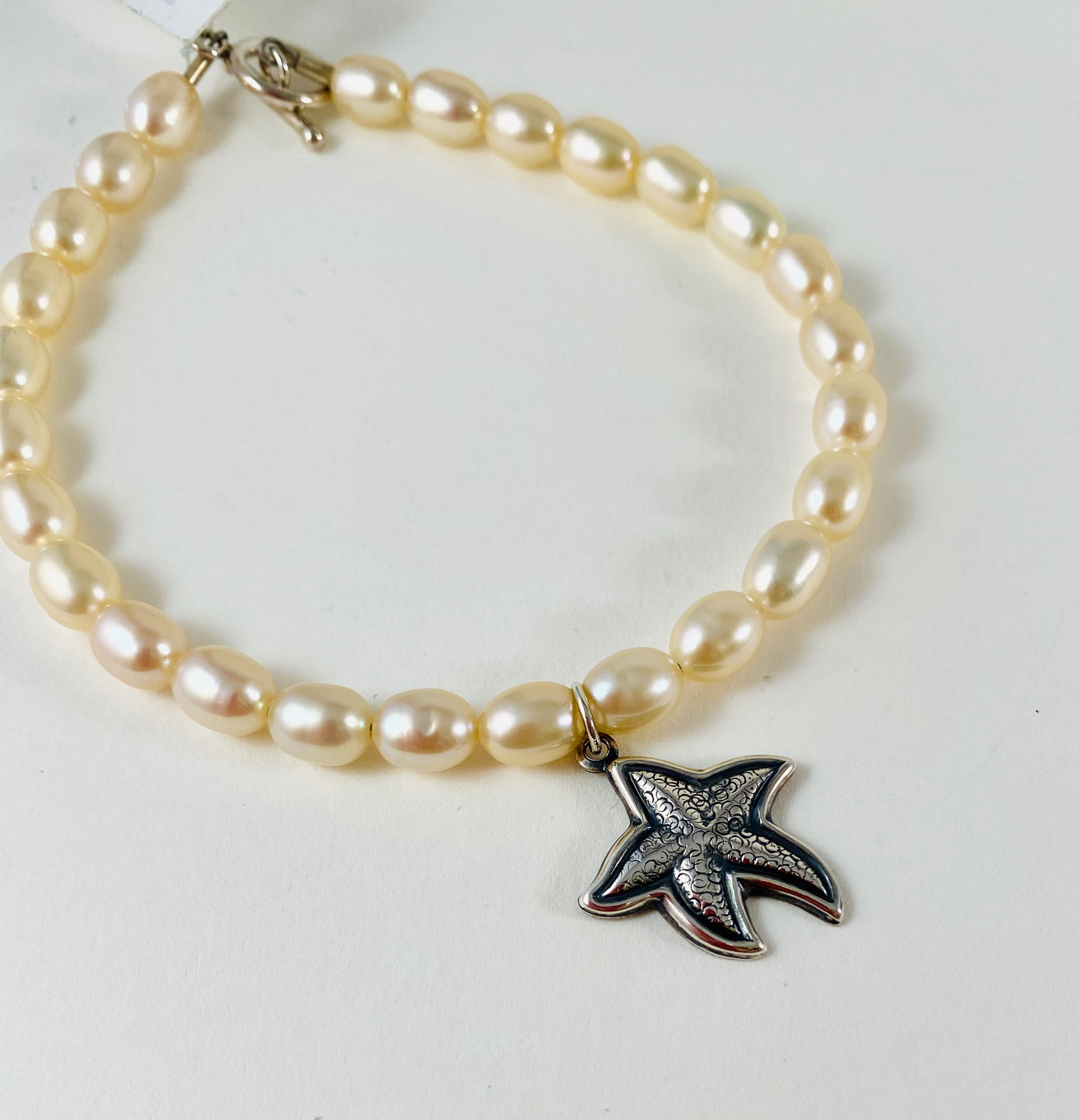 Peach Pearl Bracelet, starfish charm P12 by Nance Trueworthy
