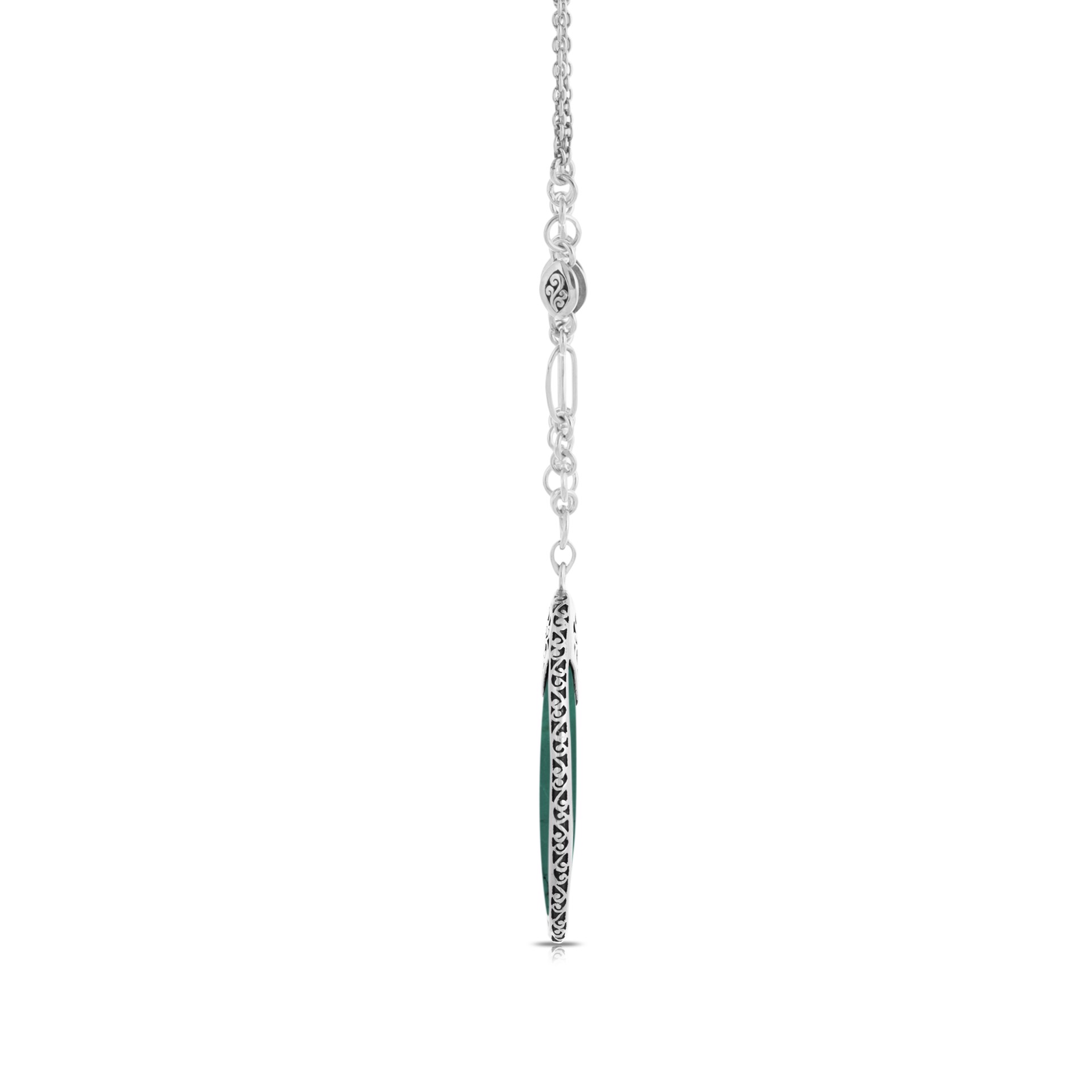 9704 Organic Shaped Turquoise with Hand Carved Scroll Rim and Back on Handmade Sterling Silver Chain, Pendant is 38 by 55mm by Lois Hill