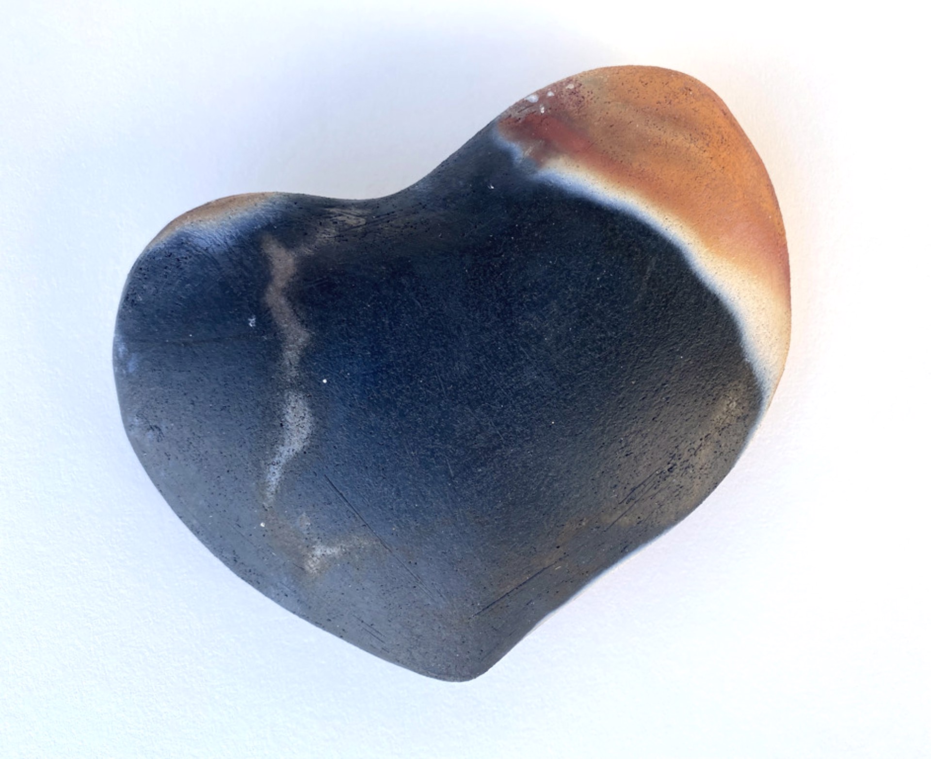 Asymmetrical pit fire heart by Minette Hawaiʻi