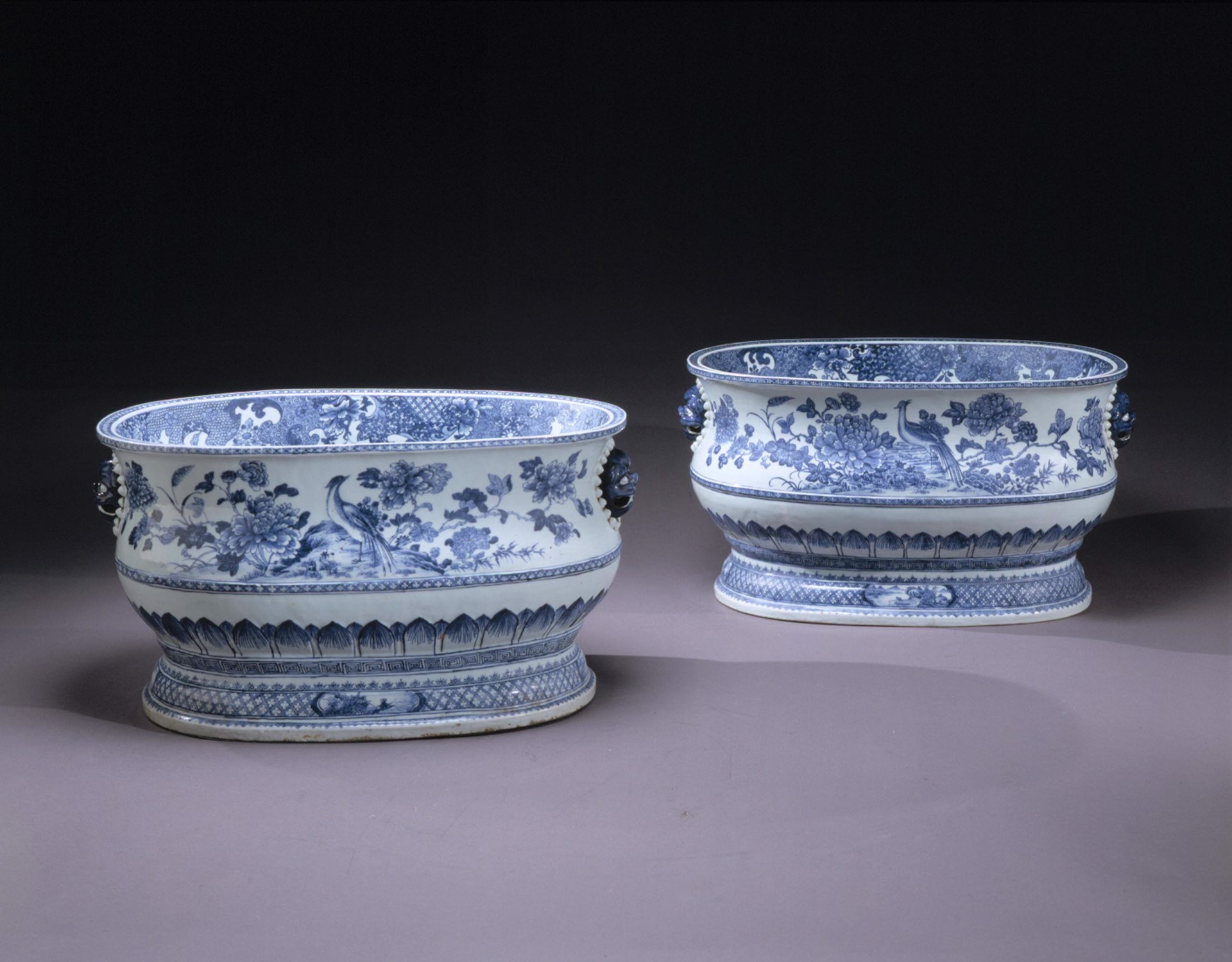 PAIR OF LARGE BLUE AND WHITE CISTERNS